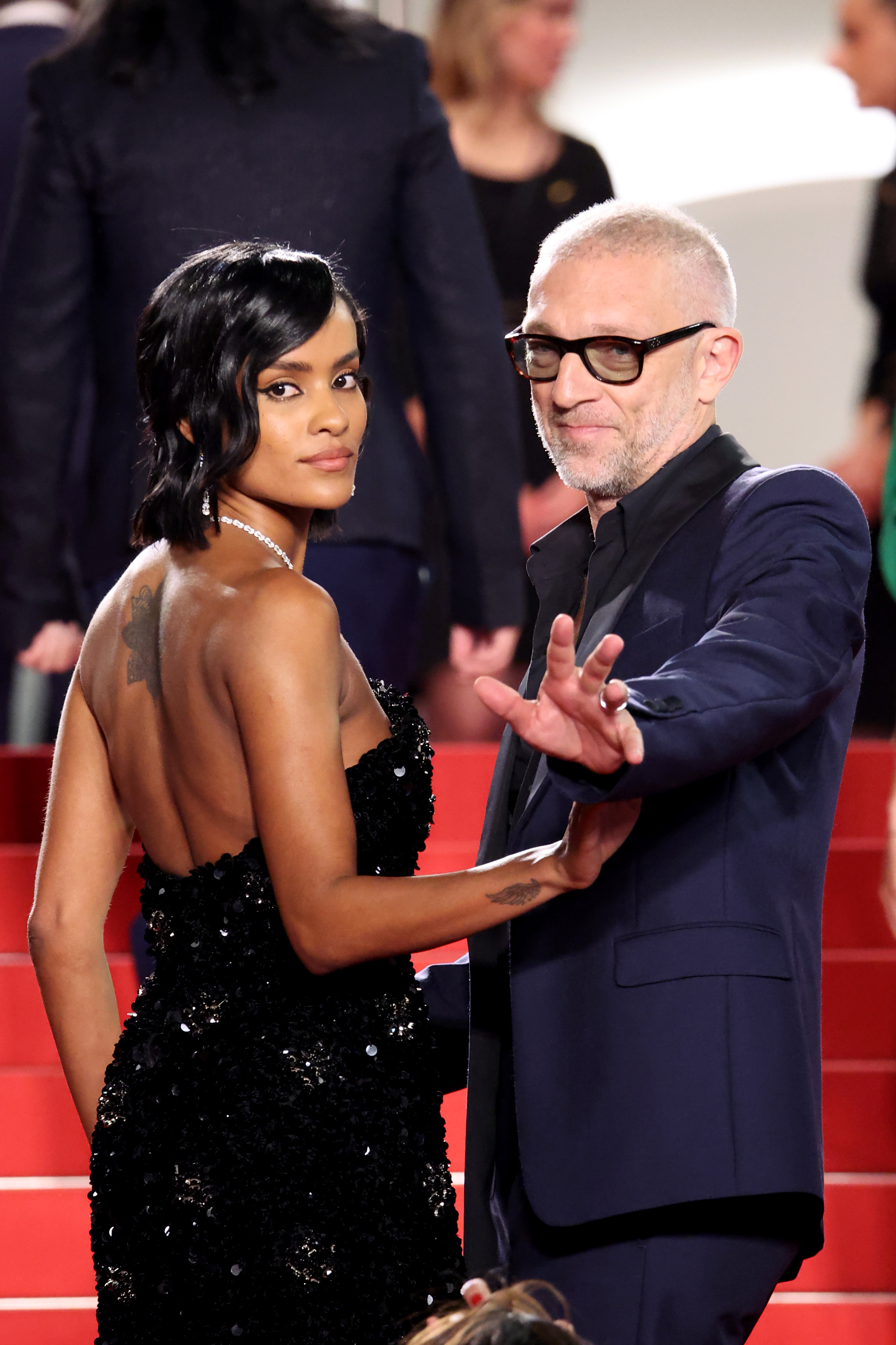 Narah Baptista and Vincent Cassel at the "Parthenope" red carpet during the 77th annual Cannes Film Festival on May 21, 2024, in France. | Source: Getty Images