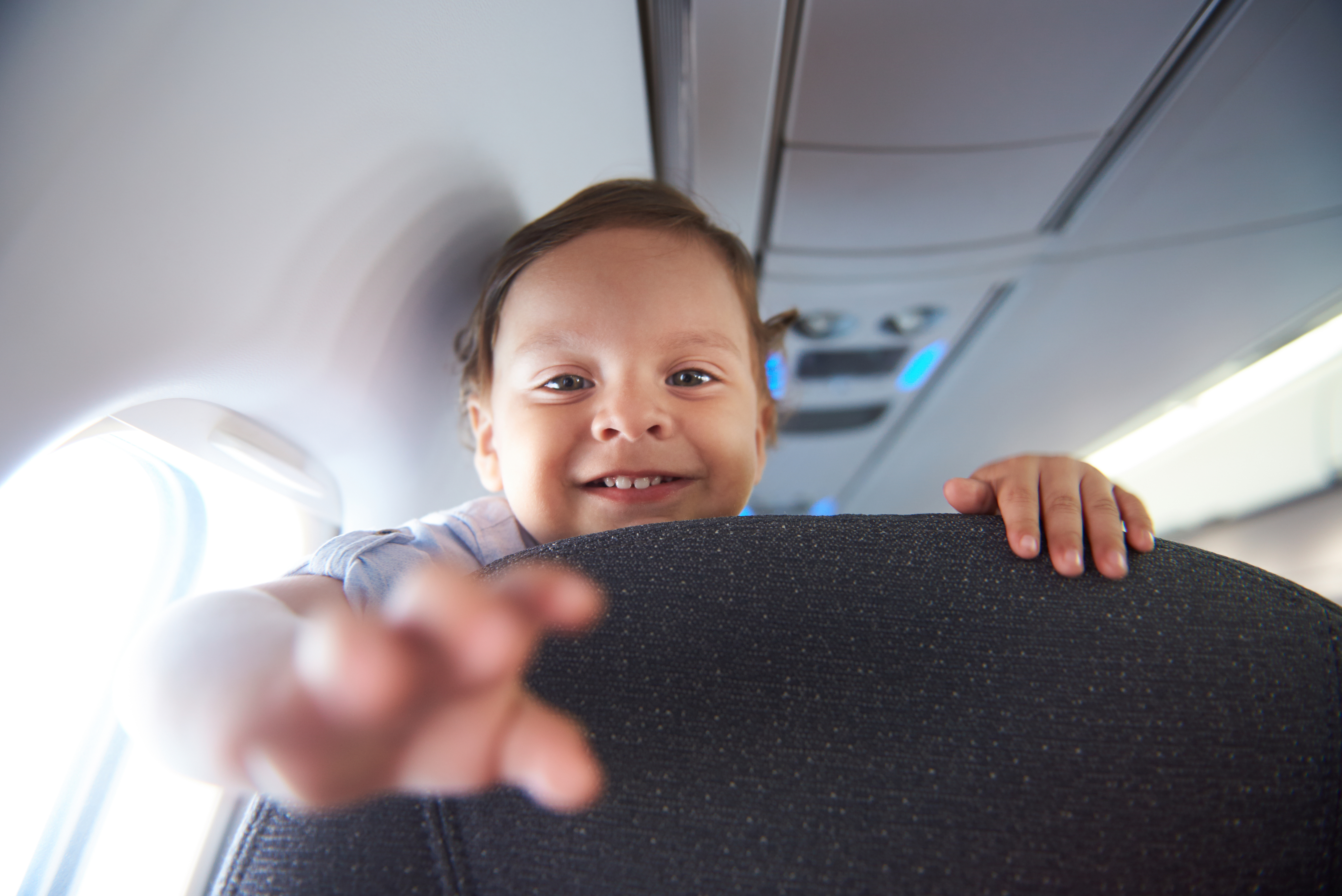 A baby in an airplane | Source: Shutterstock