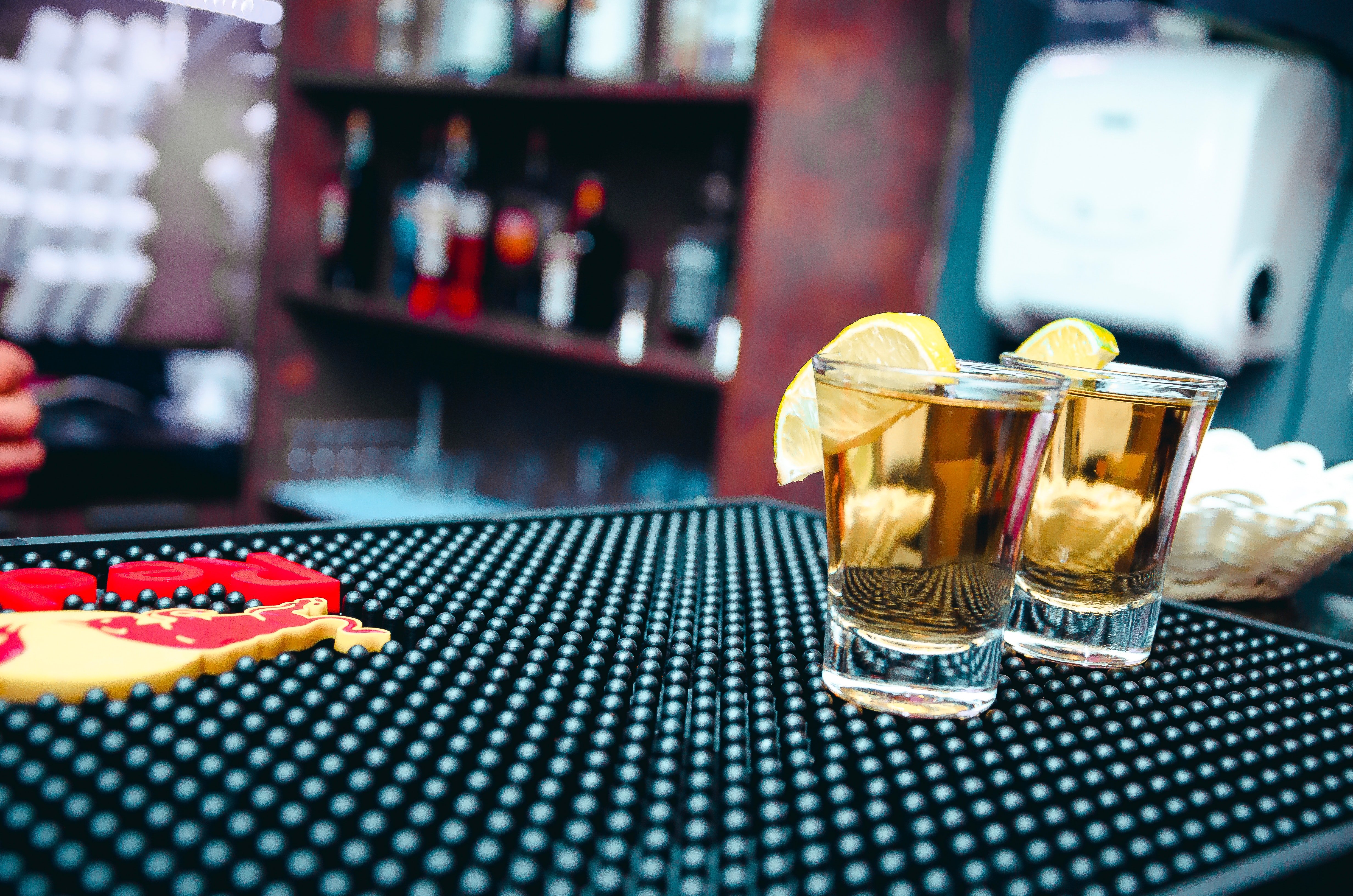 Tequila shots standing on a counter. | Source: Pexel/ Isabella Mendes