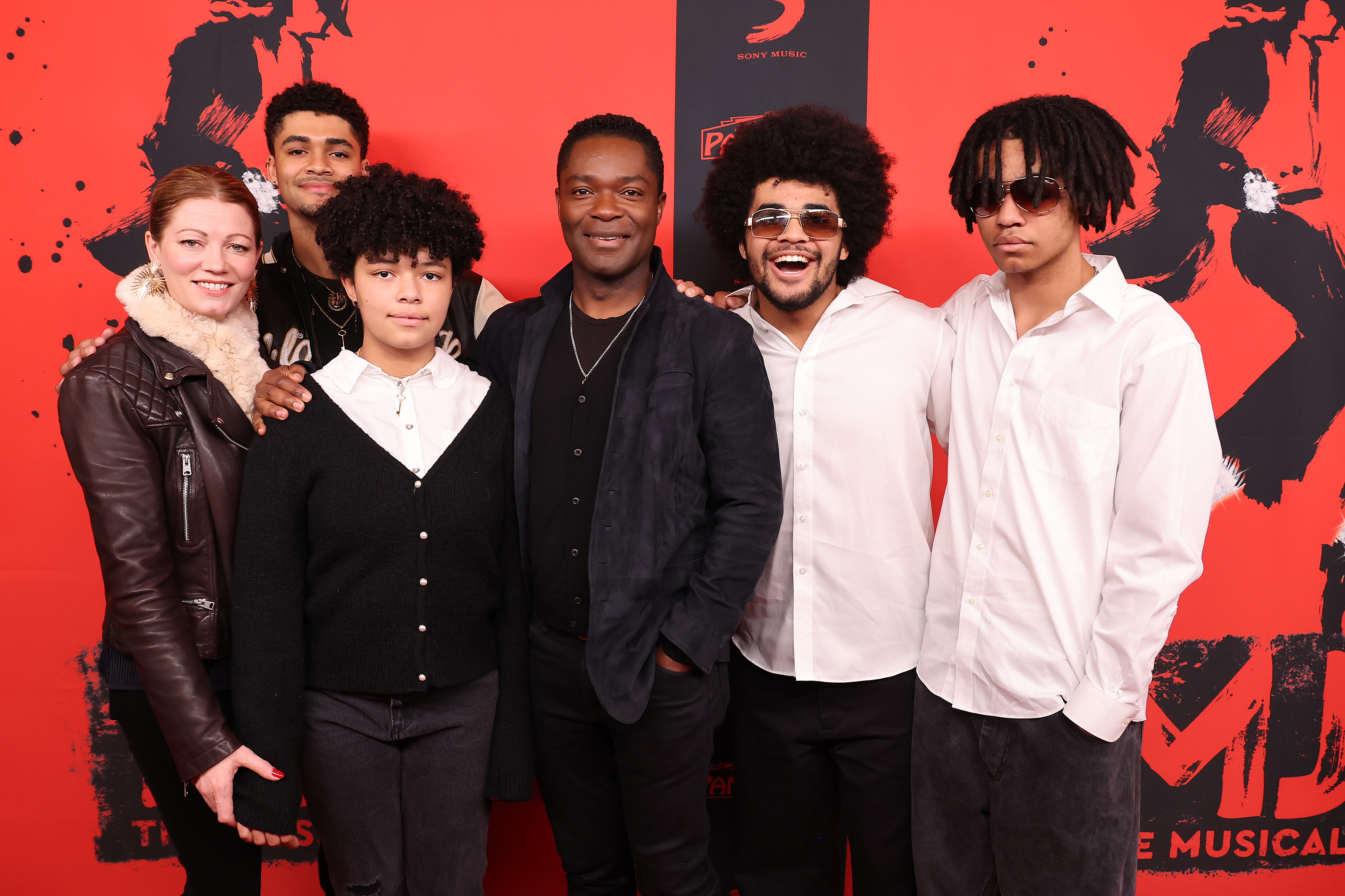 Jessica and David Oyelowo attended the opening night of "MJ: The Musical" in Hollywood on December 21, 2023, joined by their children for an evening that blended theatre, music, and family time. The image shows the Oyelowos years on from their early red carpet appearances — more relaxed, confident, and visibly united.