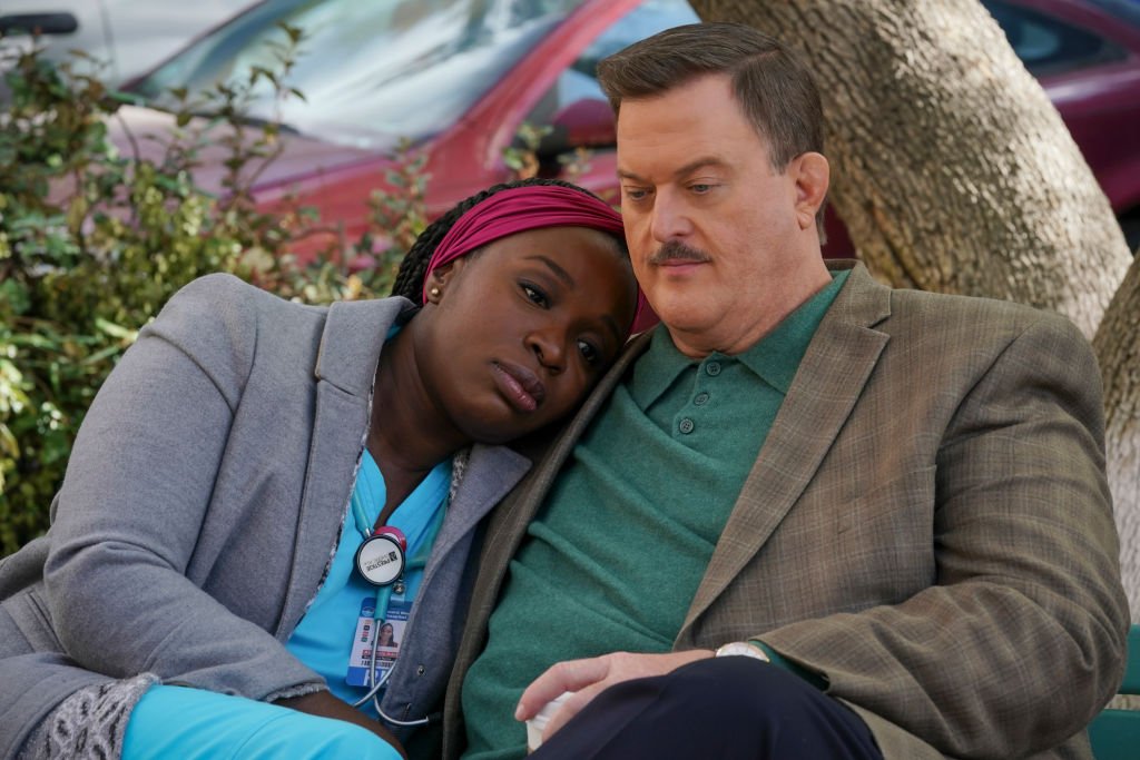 Folake Olowofoyeku as Abishola and Billy Gardell as Bob on the set of the show, "Bob Hearts Abishola" on March 2, 2020 | Photo: Getty Images