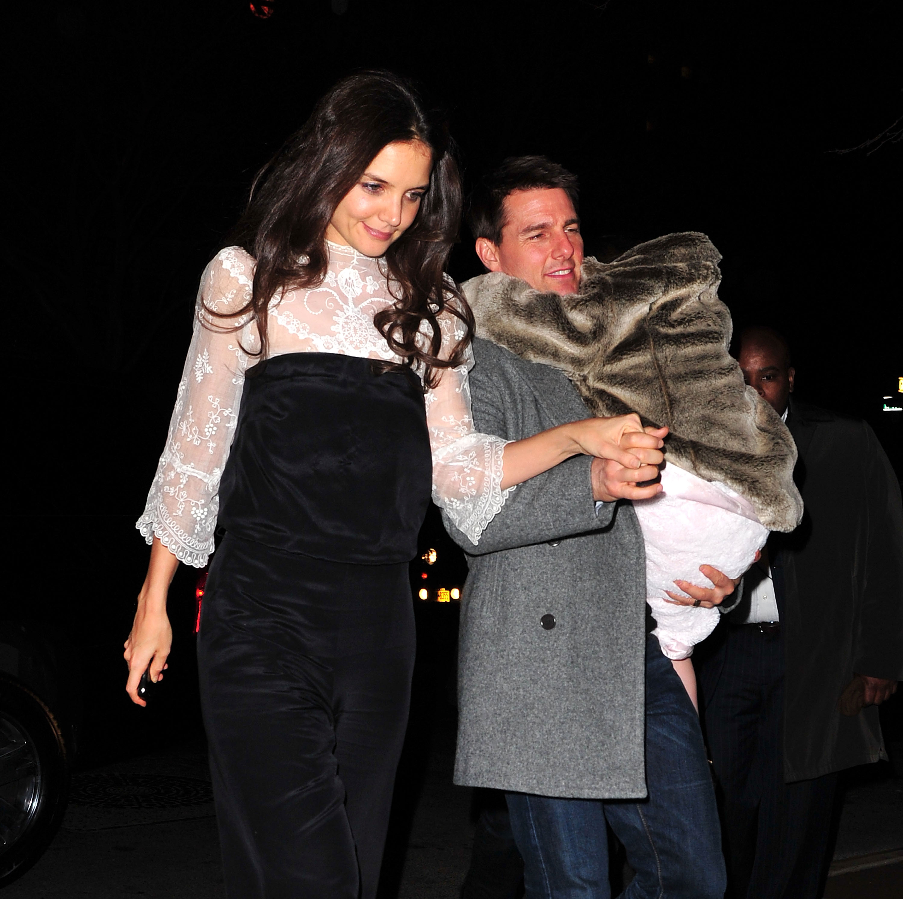 Katie Holmes, Tom Cruise and their daughter Suri Cruise seen on December 18, 2011 in New York City | Source: Getty Images