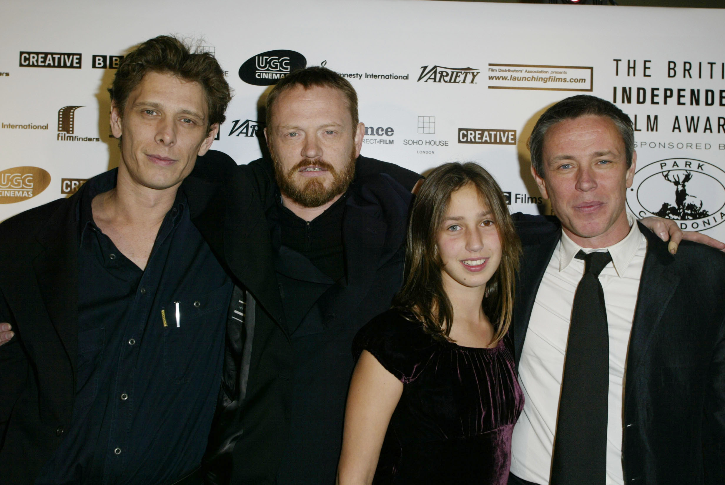 Jamie Harris, Jared Harris, Ella Harris, and Damian Harris at the British Independent Film Awards (BIFAs) on October 30, 2002, in London | Source: Getty Images