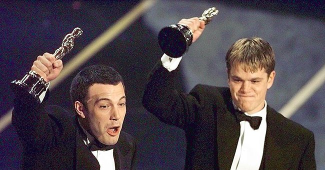 Ben Affleck and Matt Damon after winning in the Original Screenplay category during the 70th Academy Awards on March 24, 1998 | Photo: Timothy A. Clary/AFP/Getty Images