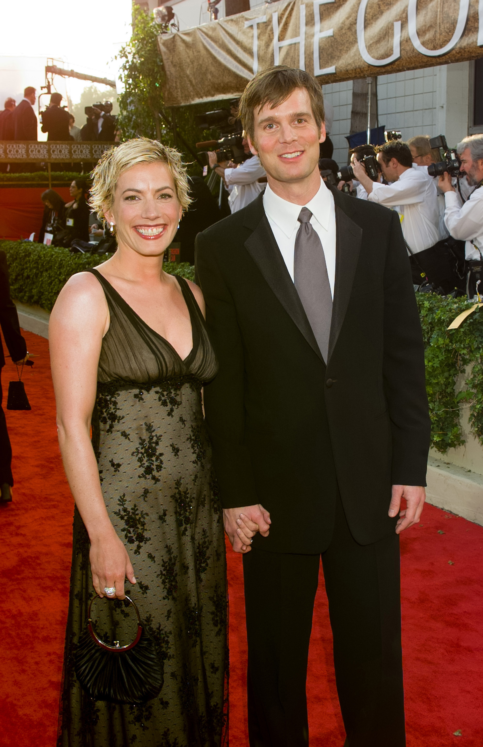 Christine King and Peter Krause arrive at the 60th Annual Golden Globe Awards at the Beverly Hilton Hotel on January 19, 2003, in Beverly Hills, California. | Source: Getty Images