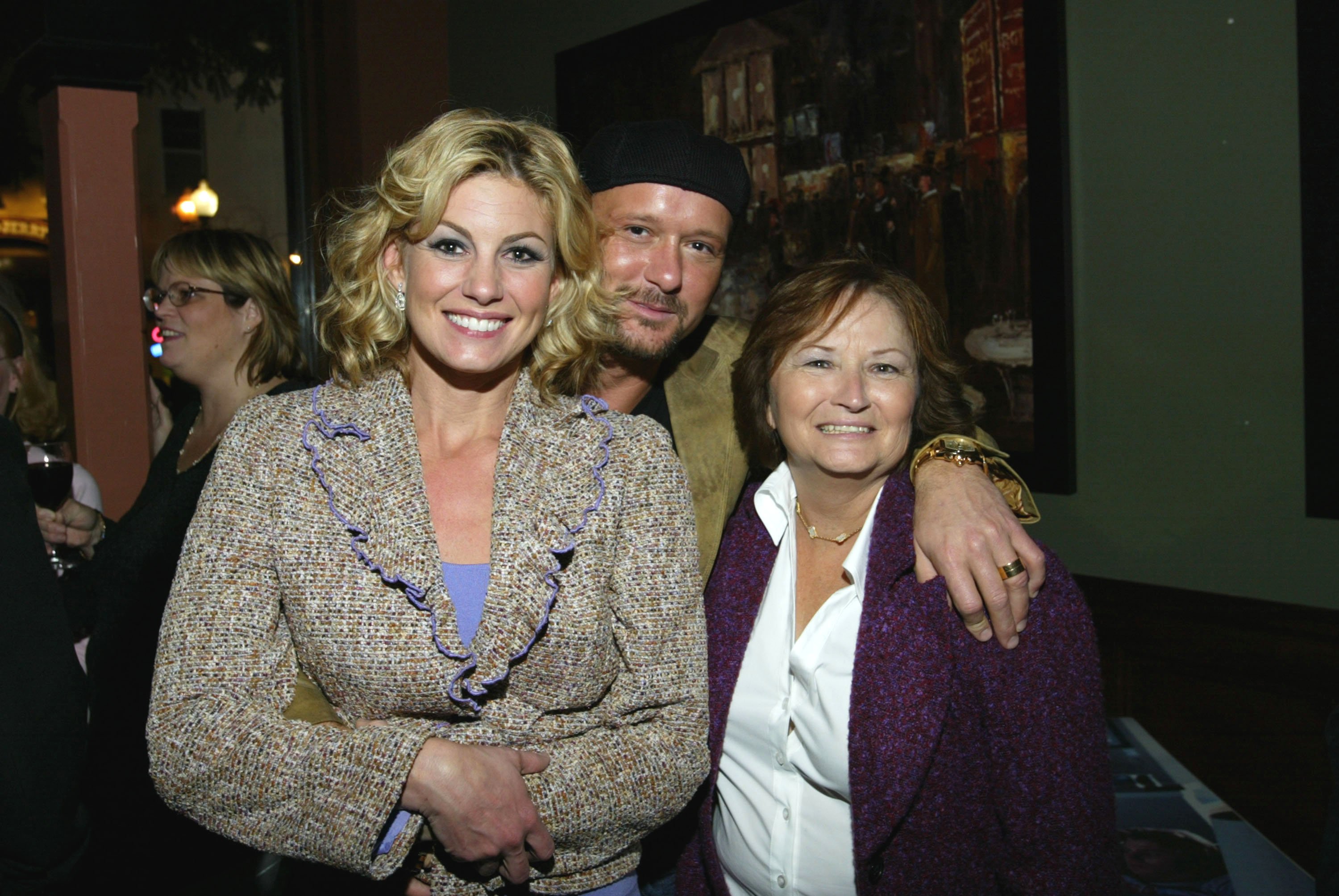 Faith Hill, Tim McGraw and Tim's mother attend the after party to celebrate the premiere of Tim McGraw 's "Friday Night Lights." | Source: Getty Images