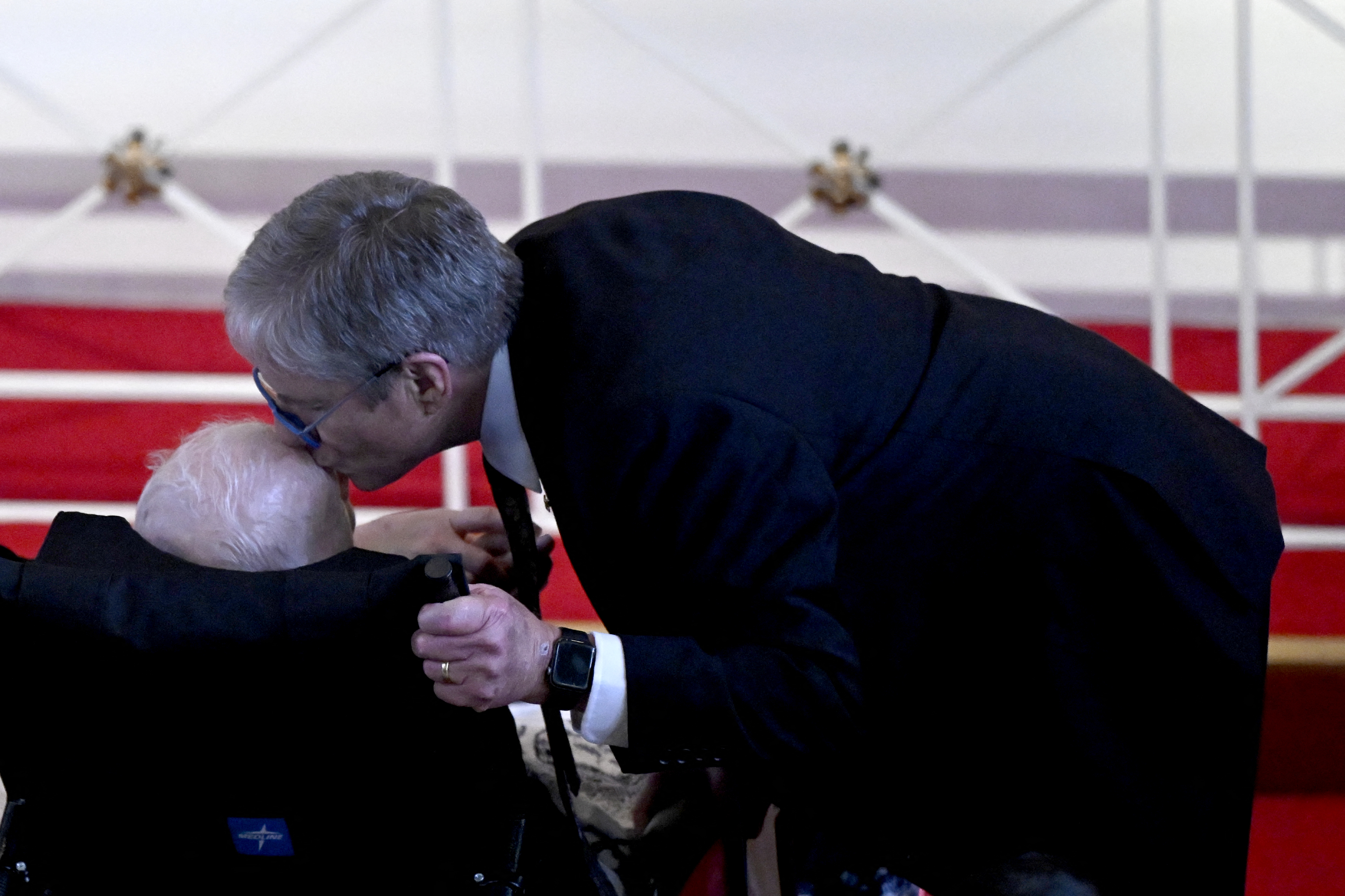 James "Chip" Carter kisses the head of his father, Jimmy Carter, during a tribute service for Rosalynn Carter, at Glenn Memorial Church in Atlanta, Georgia, on November 28, 2023. | Source: Getty Images