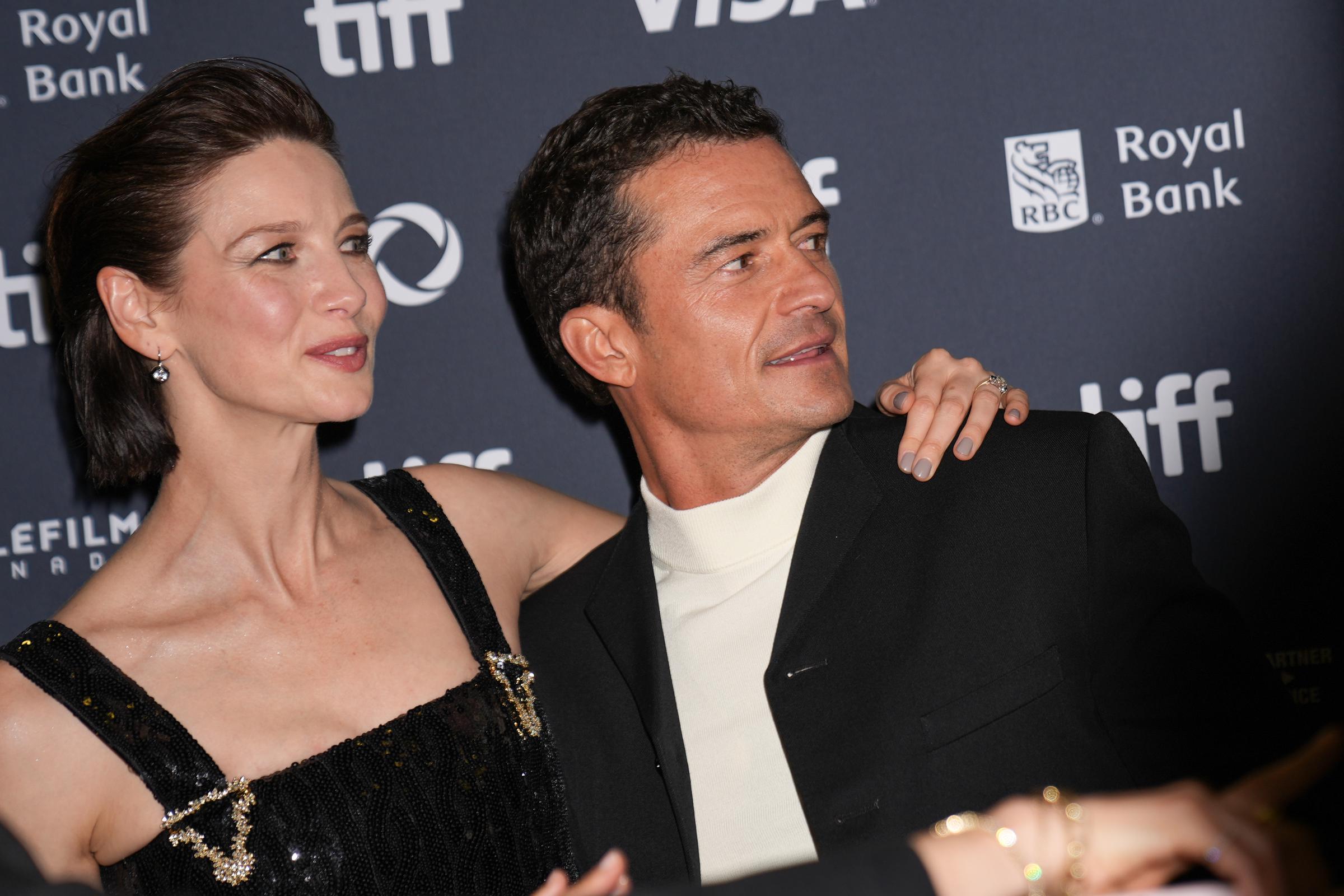 Caitriona Balfe and Orlando Bloom attend the premiere of "The Cut" during the Toronto International Film Festival on September 5, 2024 | Source: Getty Images