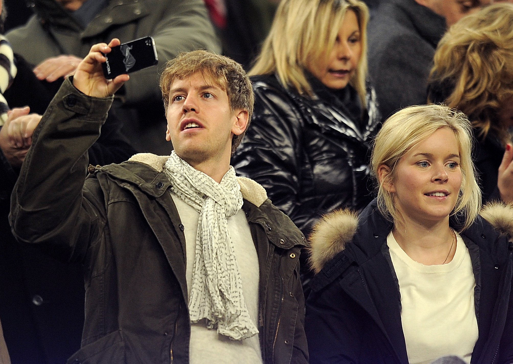 Sebastian Vettel and Hanna Prater during the Spanish league football match between FC Barcelona and Valencia CF at the Camp Nou stadium on February 19, 2012, in Barcelona, Spain. | Source: Getty Images