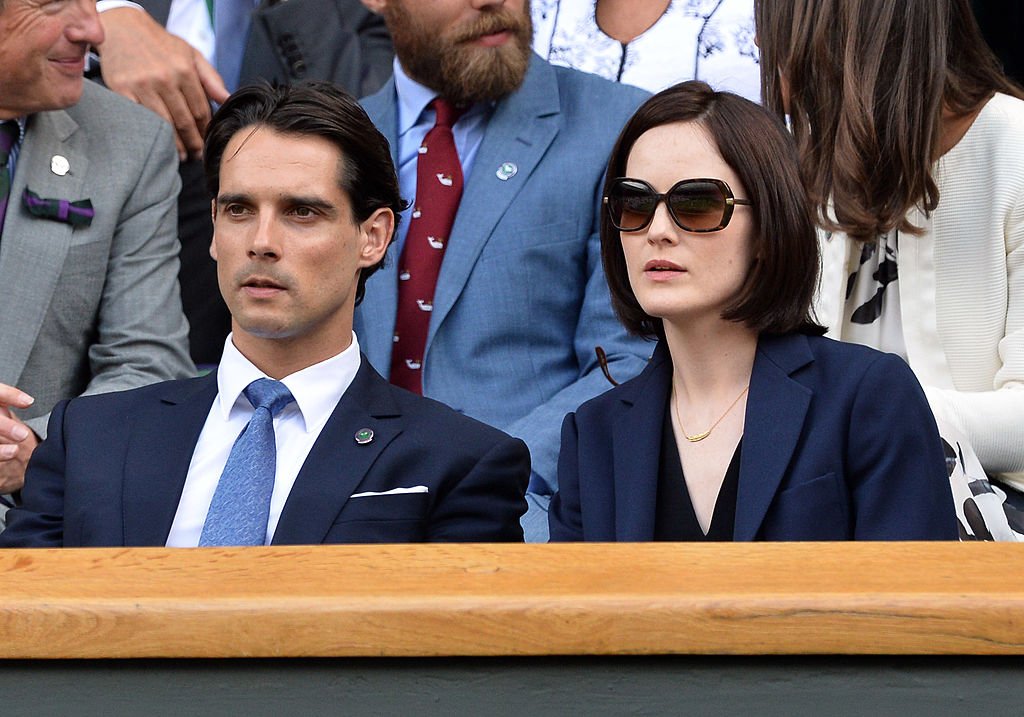 Michelle Dockery and John Dineen at the Lukas Rosol v Rafael Nadal match on centre court at Wimbledon on June 26, 2014 | Photo: Getty Images