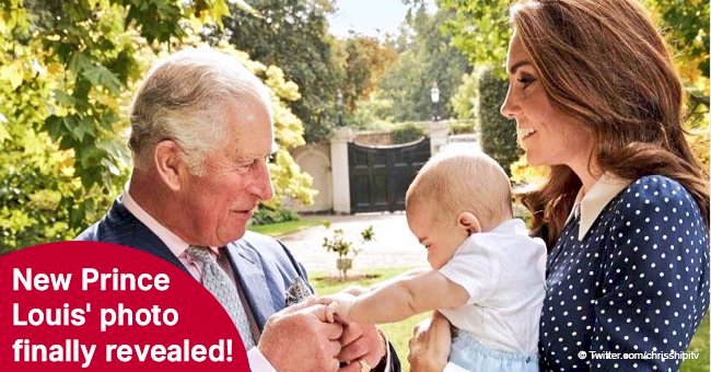 Prince Louis shakes grandpa Charles’ hand in brand new family photo with mother Kate