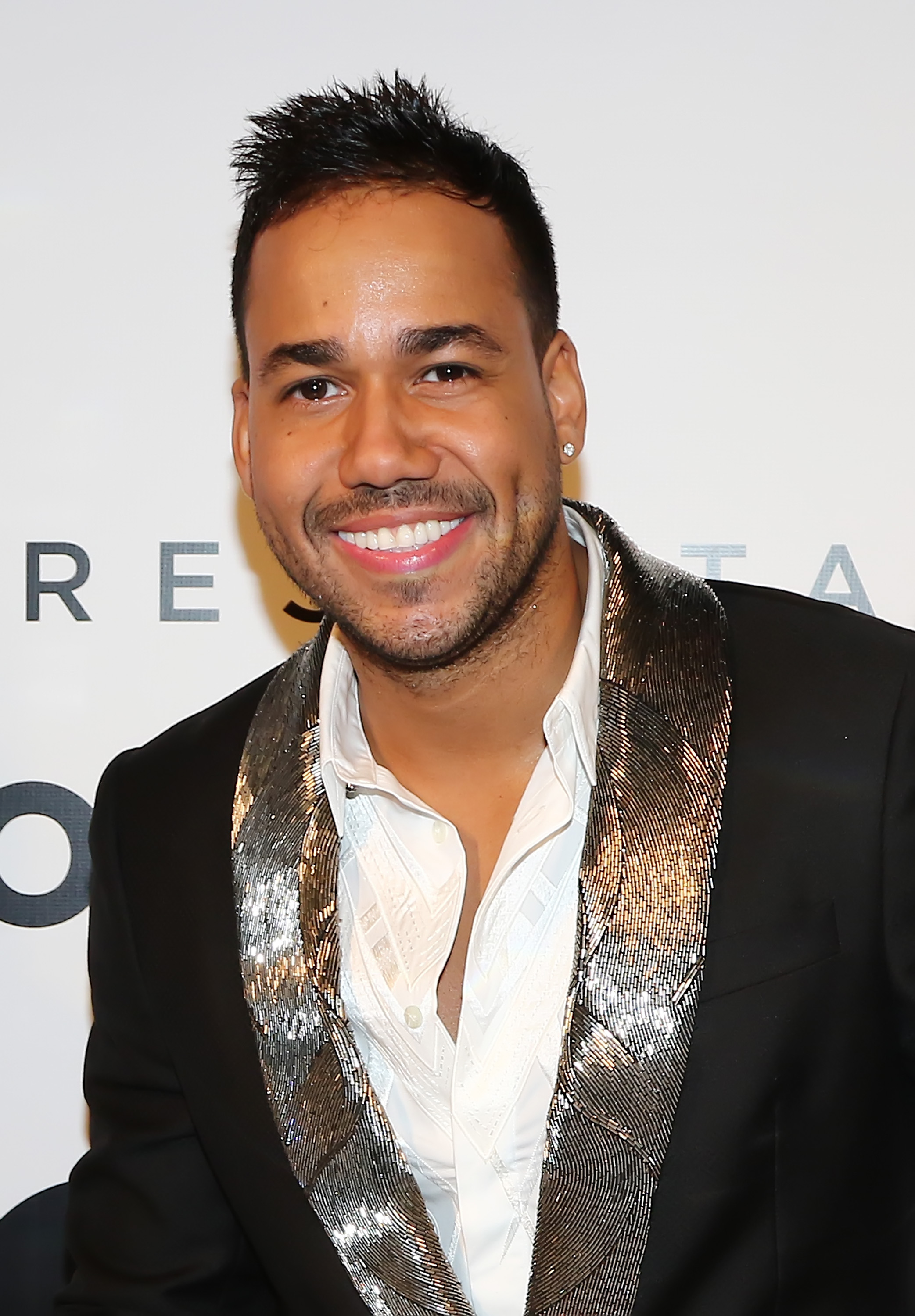 Romeo Santos poses backstage at the 2015 Billboard Latin Music Awards presented by State Farm on Telemundo at Bank United Center on April 30, 2015, in Miami, Florida. | Source: Getty Images