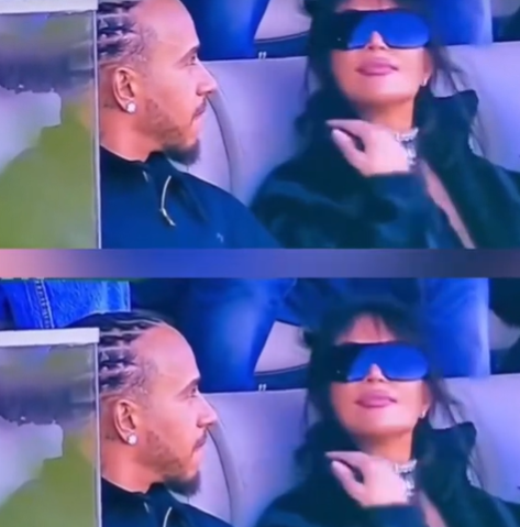 Kim Kardashian adjusts her collar during the Superbowl, from a video dated February 9, 2026. | Source: TikTok/hellomag