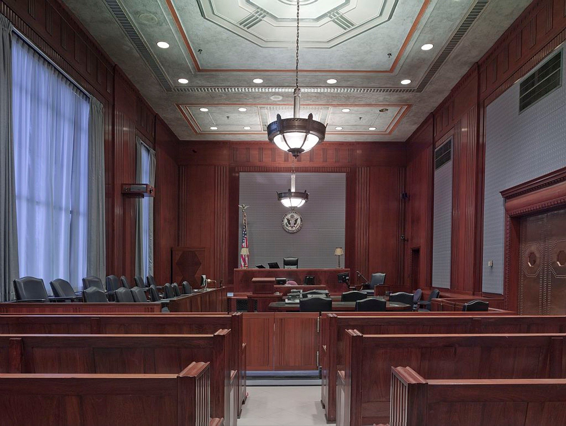 Pictured - Courtroom benches | Sources: Pixabay