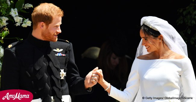 Moment when Meghan and Prince Harry show off their wedding rings for the first time
