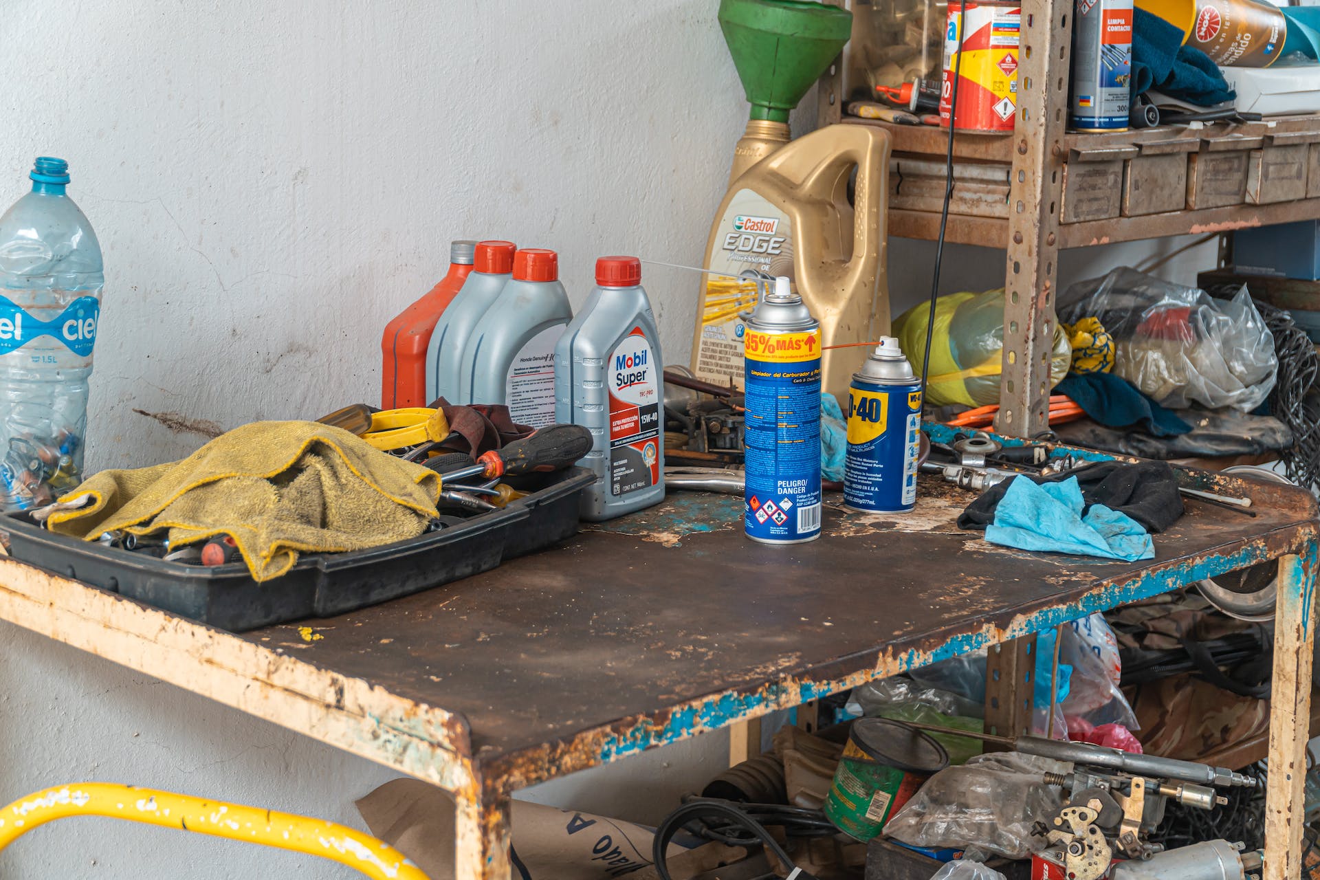 A messy table with engine oils | Source: Pexels