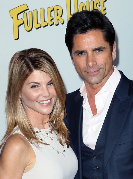 Lori Loughlin and John Stamos at Pacific Theatres at The Grove on February 16, 2016 in Los Angeles, California | Photo: Getty Images