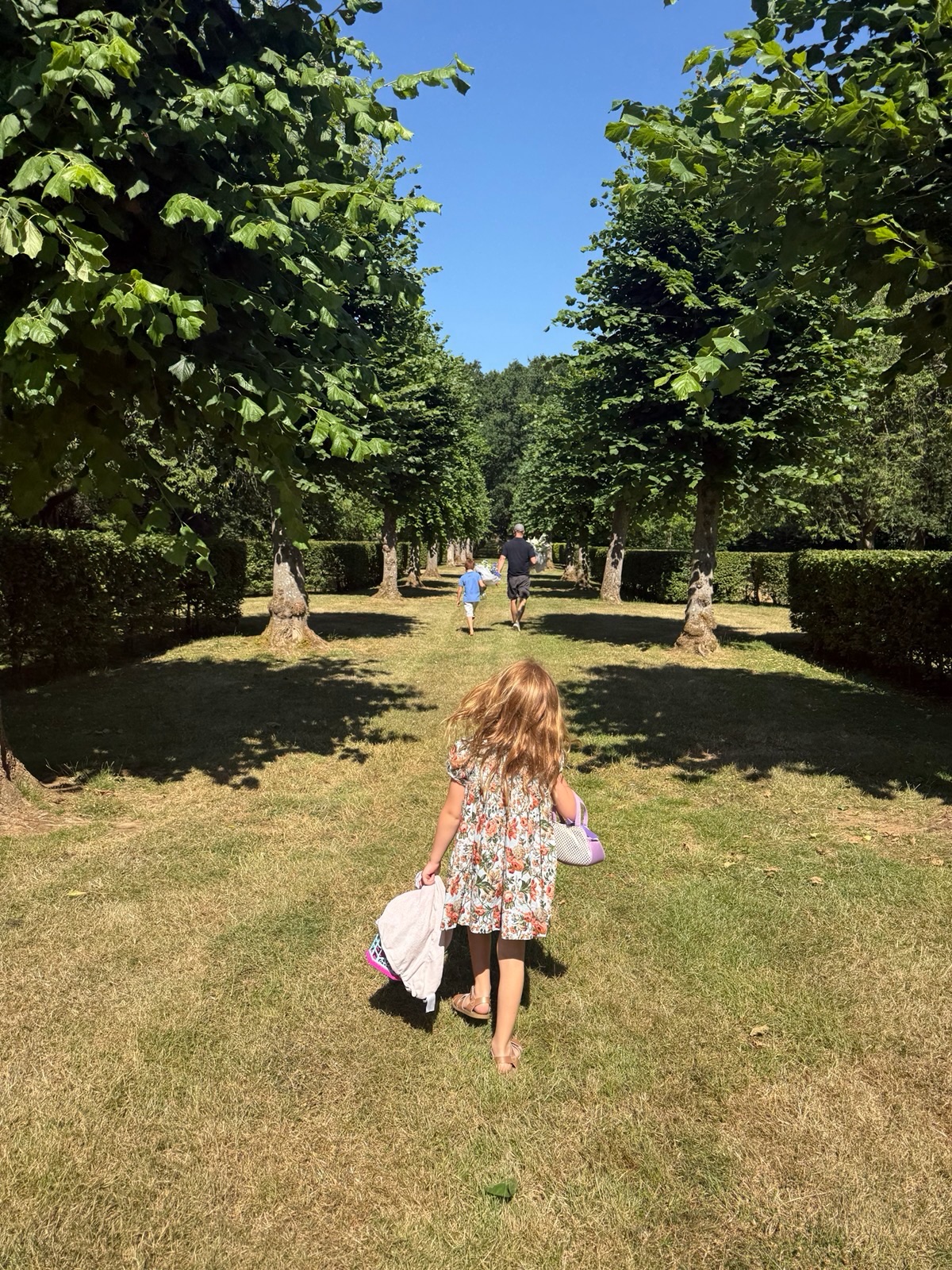 This image became the emotional centerpiece of Meghan's post after reports linked the setting to Althorp. Harry and Archie were reportedly carrying flowers during the apparent visit to Princess Diana's resting place. | Source: Instagram/meghan