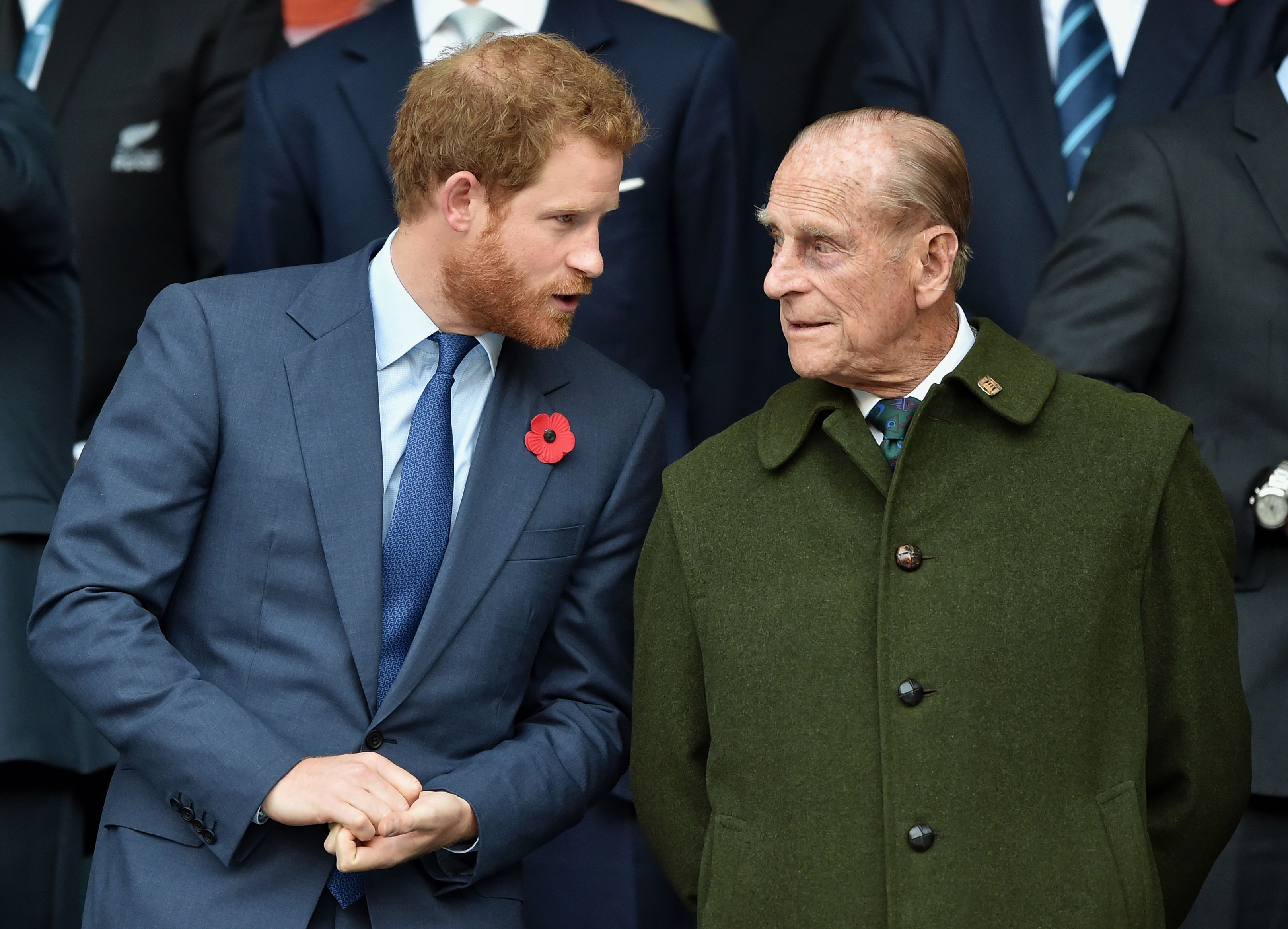 Prince Harry and Prince Philip, Duke of Edinburgh at the 2015 Rugby World Cup Final match between New Zealand and Australia at Twickenham Stadium in London, England | Photo: Getty Images
