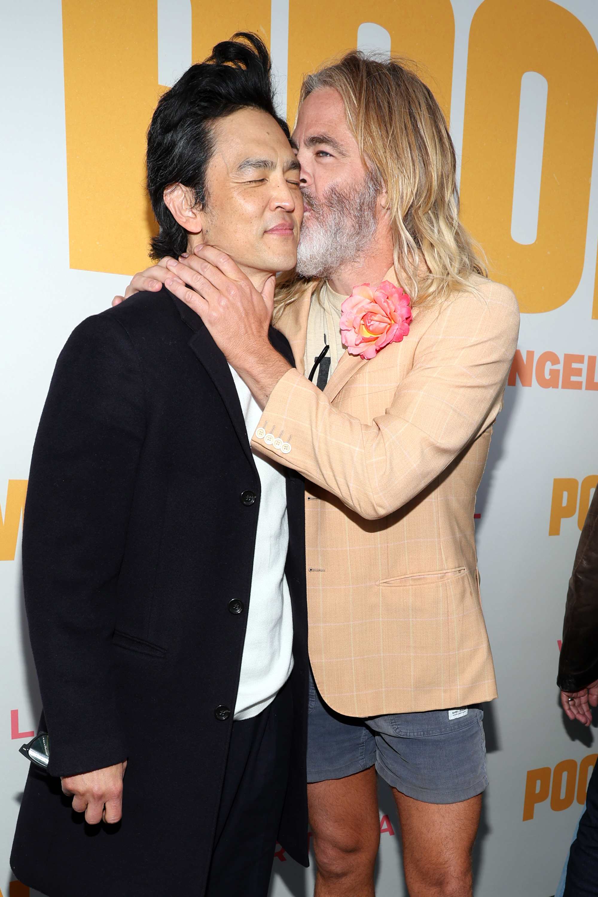 John Cho and the movie star at the Los Angeles premiere of "Poolman," 2024 | Source: Getty Images