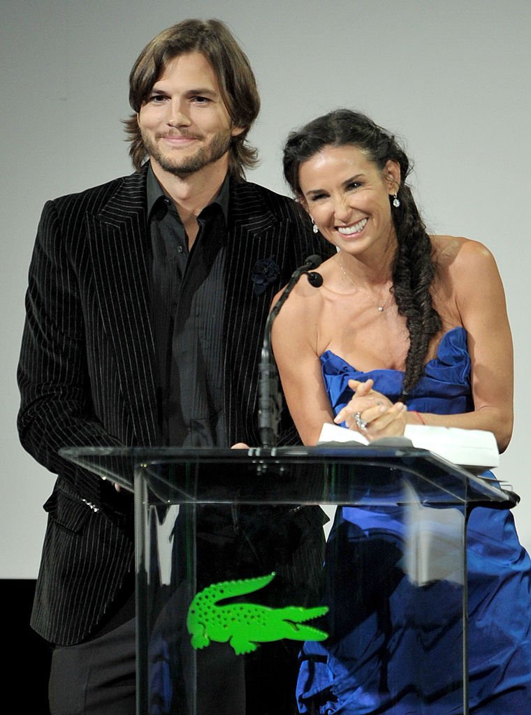  Actors Ashton Kutcher (L) and Demi Moore speak onstage at the 13th Annual Costume Designers Guild Awards with presenting sponsor Lacoste held at The Beverly Hilton hotel | Photo: Getty Images