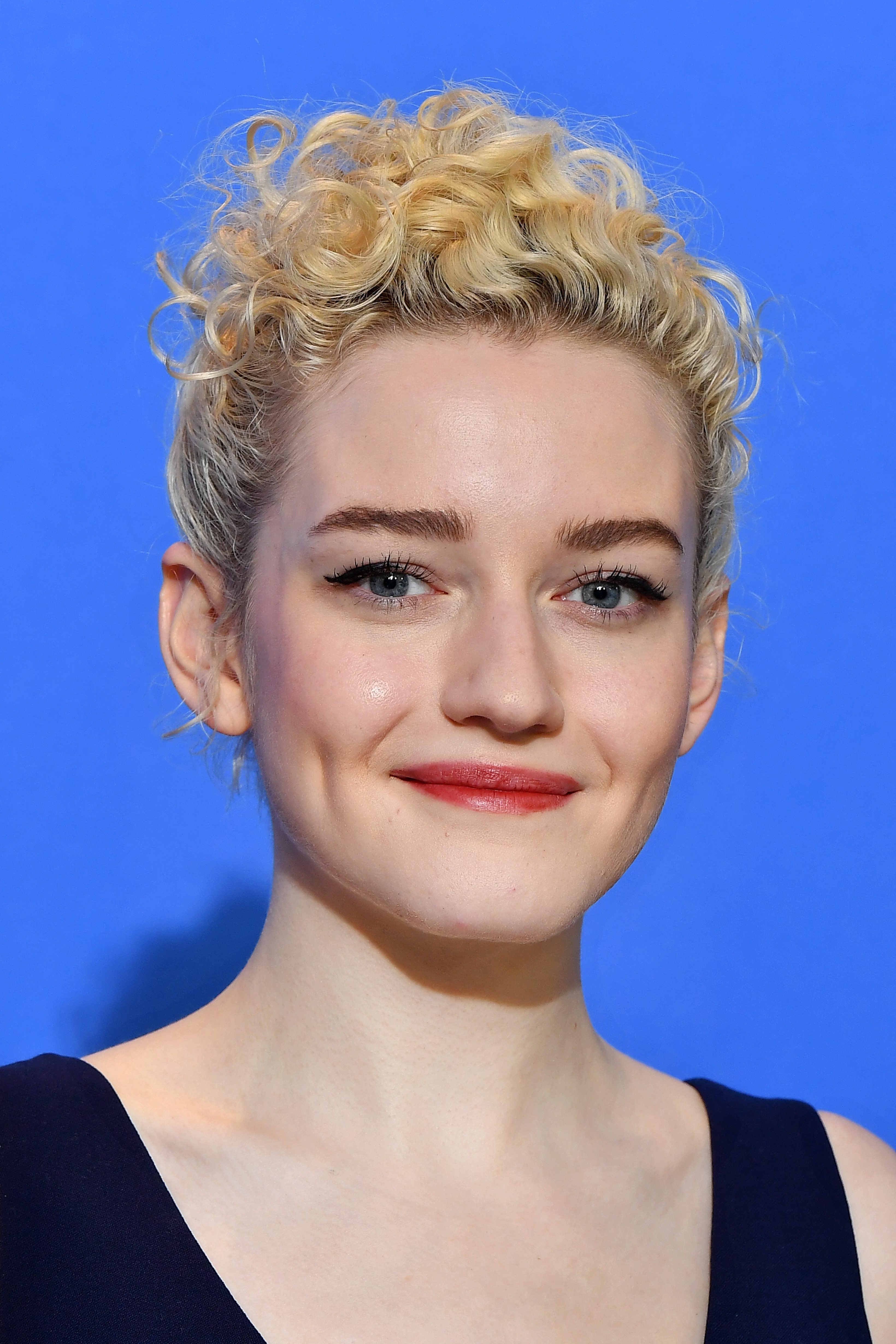 Julia Garner attends "The Assistant" photocall during the 70th Berlinale International Film Festival Berlin at Grand Hyatt Hotel on February 23, 2020, in Berlin, Germany. | Source: Getty Images