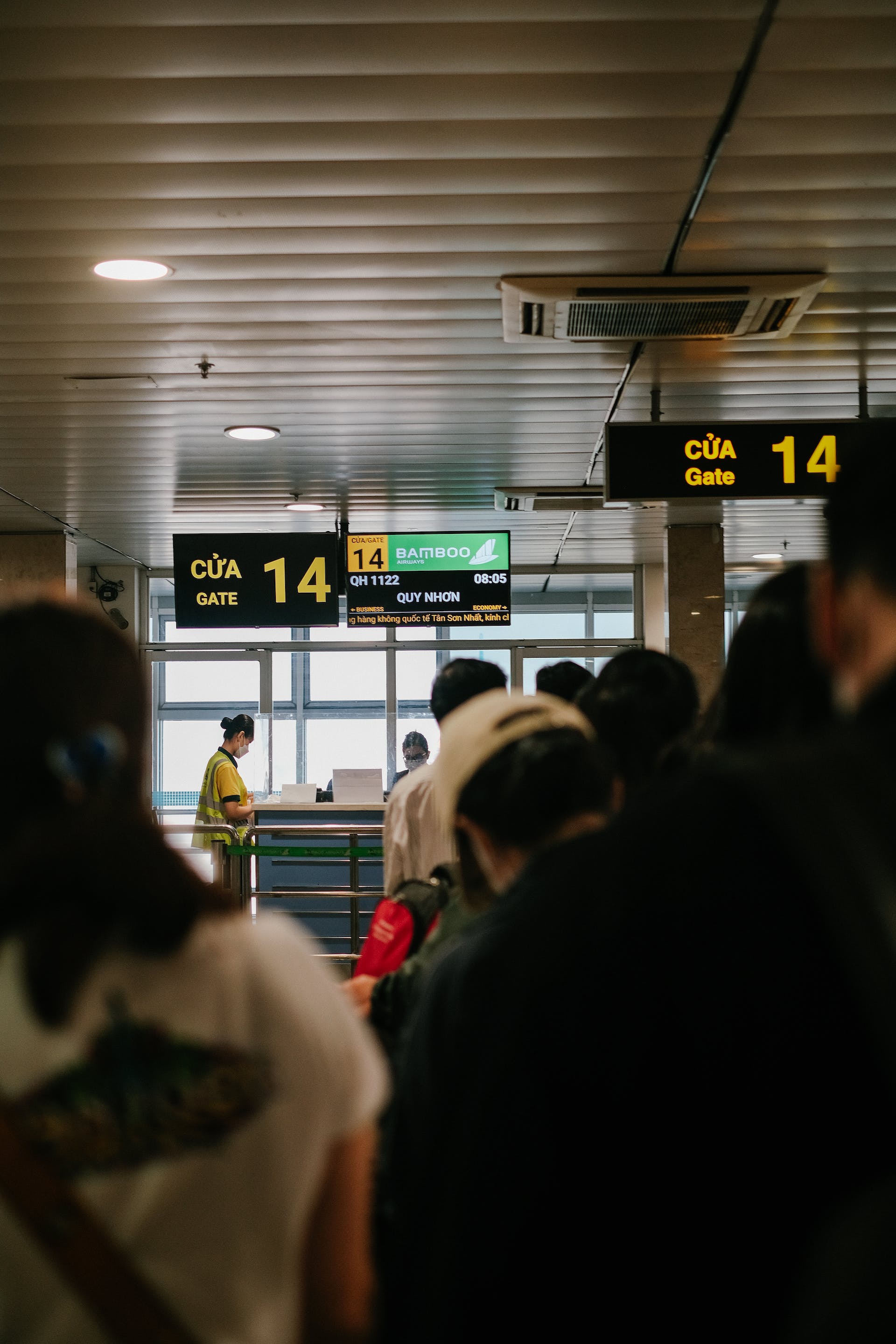 People standing in a queue at an airport | Source: Pexels