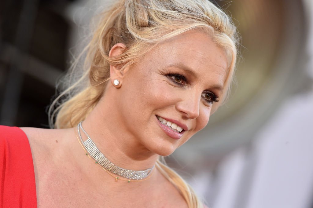Britney Spears smiles for the camera at the Premiere of Once Upon a Time in Hollywood, held in Hollywood, California on July 22,2019. |Photo by Axelle/Bauer-Griffin/FilmMagic 