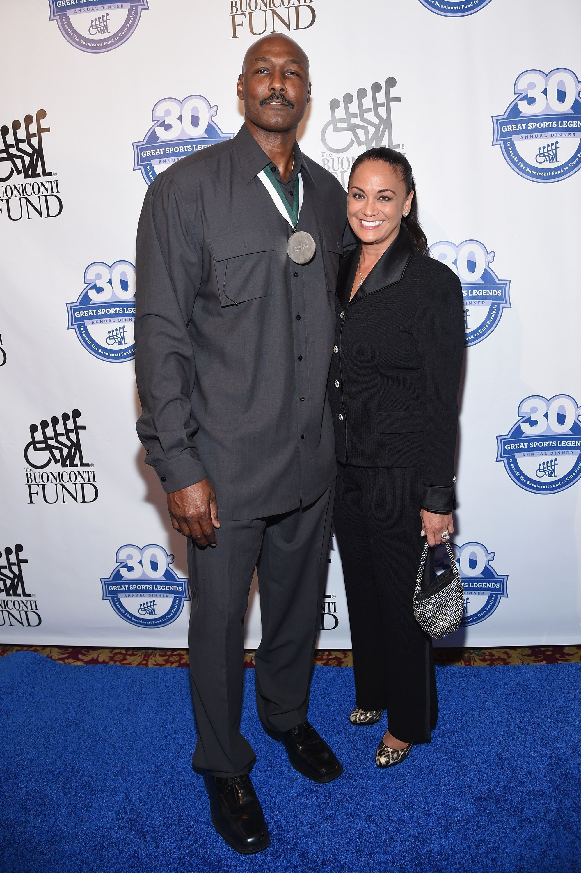Karl Malone and his wife Kay Kinsey Malone attend the 30th Annual Great Sports Legends Dinner to benefit The Buoniconti Fund to Cure Paralysis at The Waldorf Astoria on October 6, 2015 in New York City. | Source: Getty Images