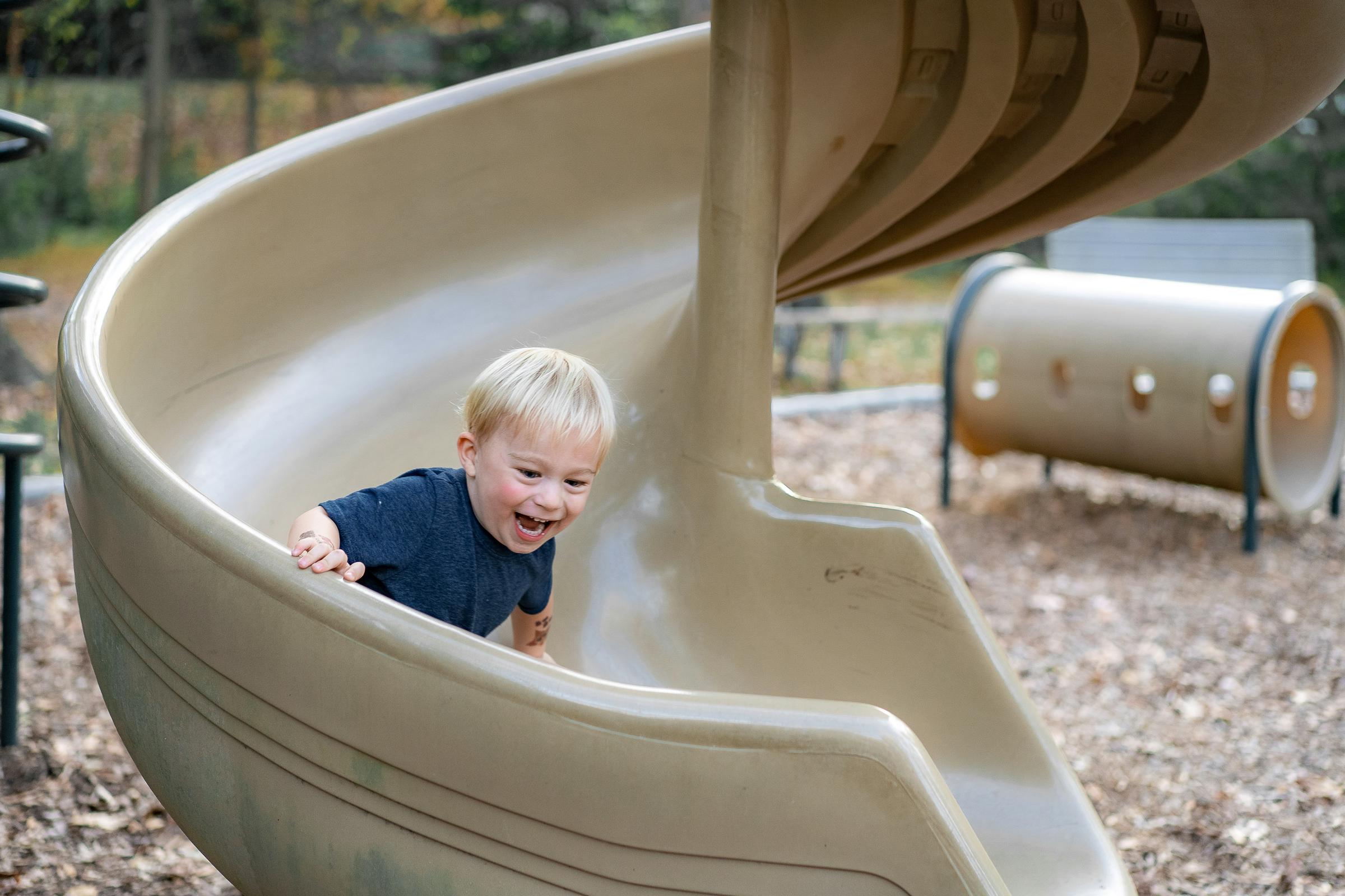 A child on a slide | Source: Unsplash