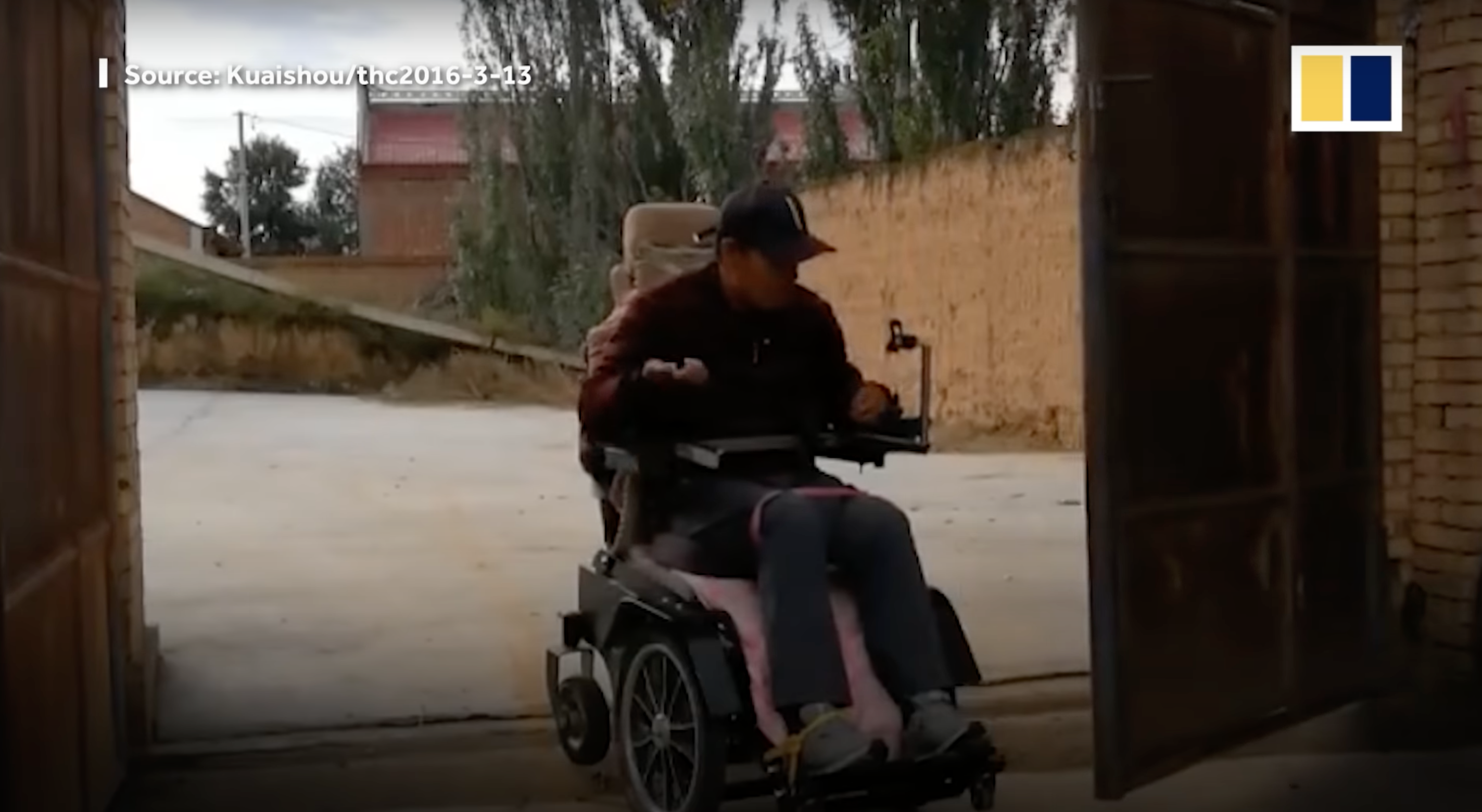 Tian operating his wheelchair. | Source: YouTube.com/South China Morning Post