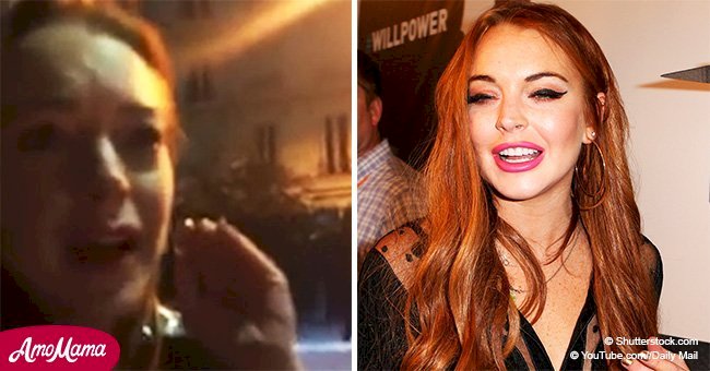 Lindsay Lohan gets hit by a homeless mom on the street for trying to take her son away from her 