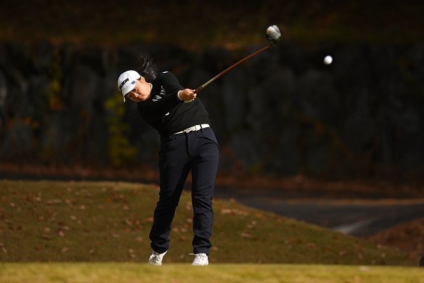 A golfer pictured hitting her tee shot on the 8th hole during the final round of the Japanese LPGA Final Qualifying Tournament | Photo: Getty Images