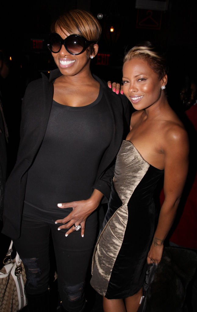 Reality TV personality NeNe Leakes and actress Eva Marcille attend a private after party for Our Family Wedding at Katra Lounge | Photo: Getty Images