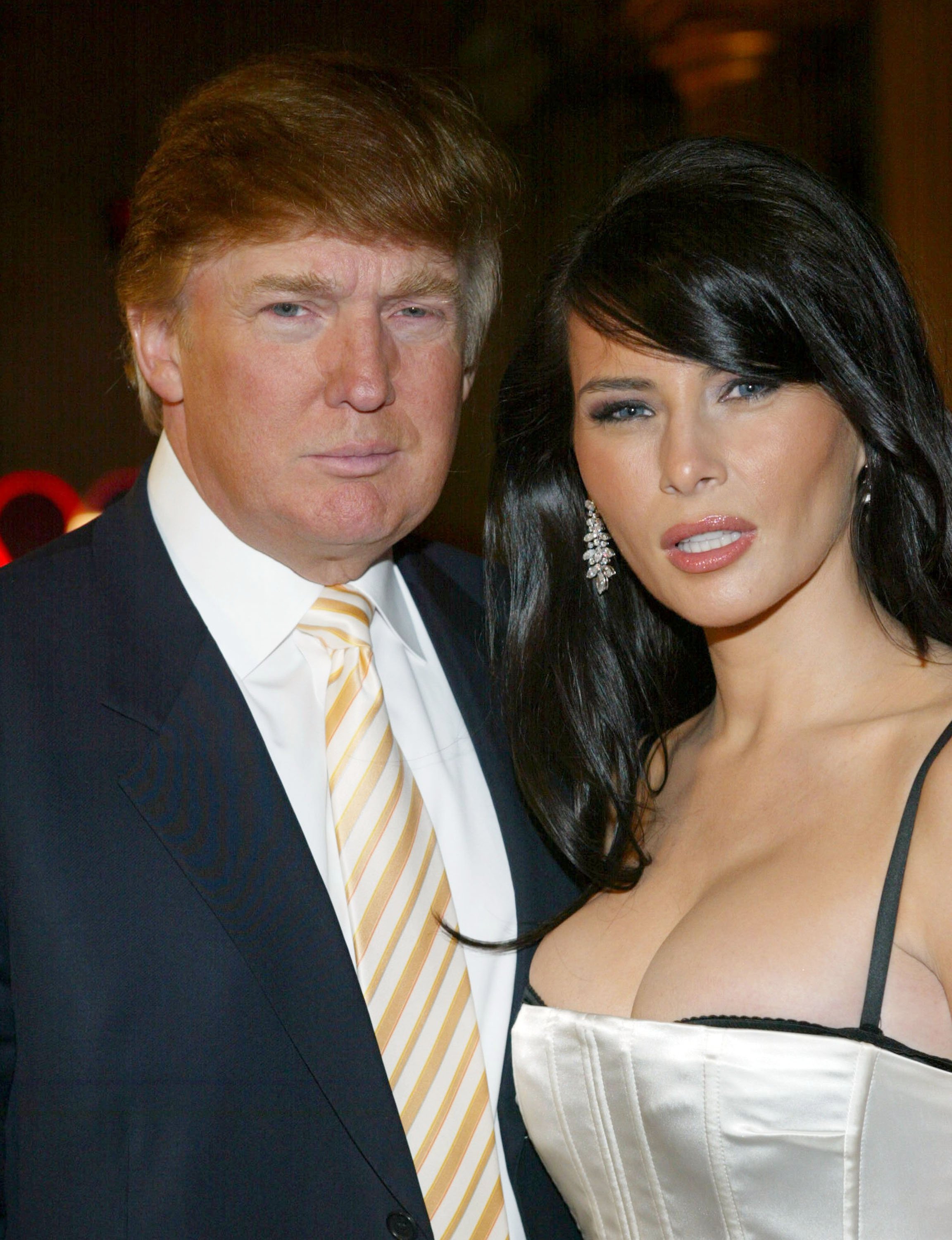 Donald and Melania Trump backstage of the Luca Luca Spring 2003 fashion show | Photo: Getty Images