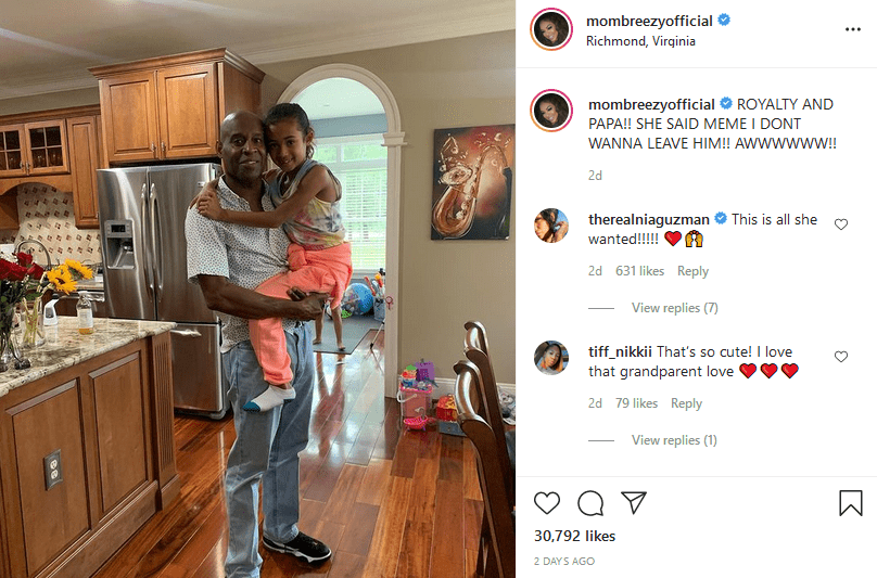 Clinton Brown and his daughter Royalty Brown, looking adorable in a picture | Photo: Instagram/mombreezyofficial