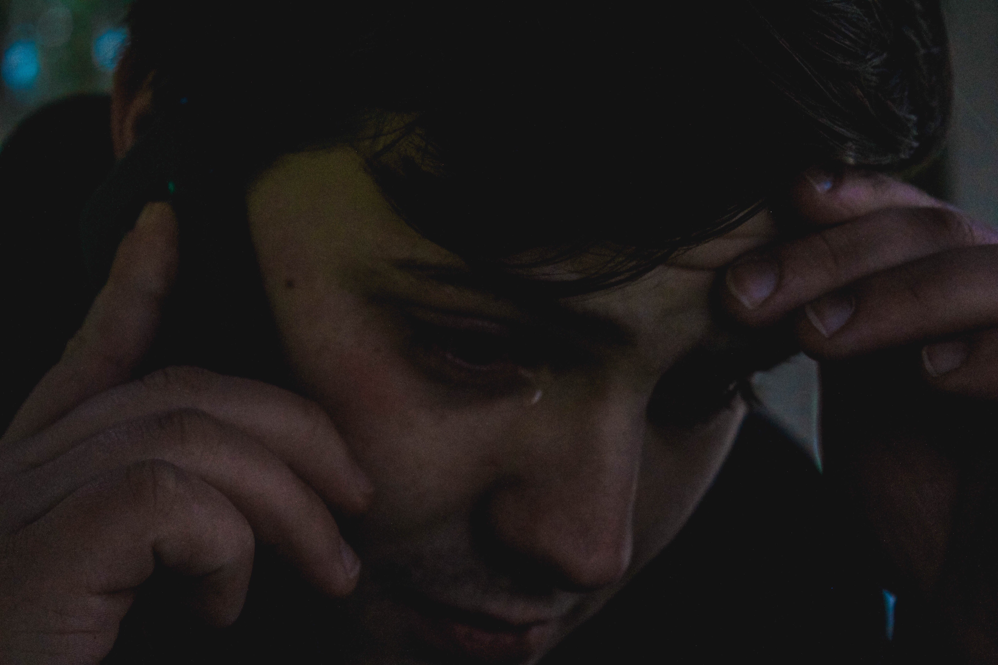 An emotional man talking on the phone | Source: Getty Images