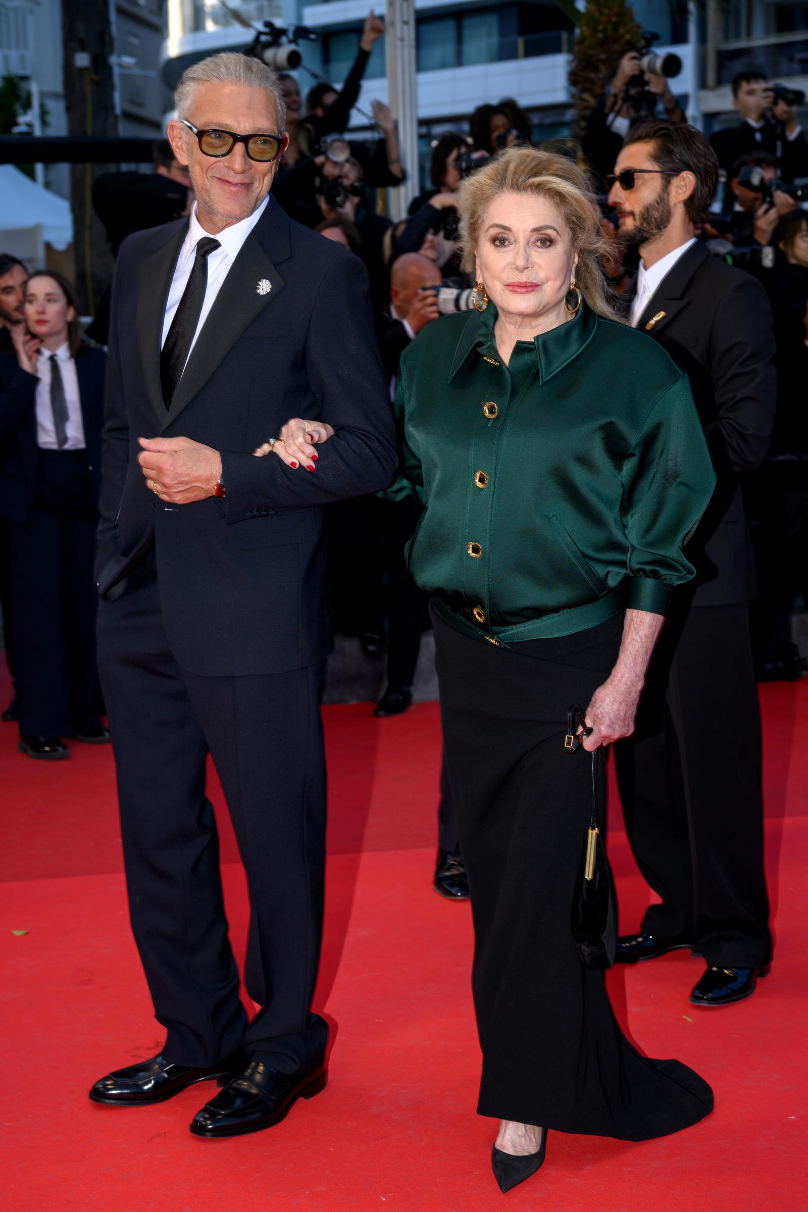 The actress (L), with Vincent Cassel, attends the "Histoires Parallèles (Parallel Tales)" screening during the 79th annual Cannes Film Festival at Palais des Festivals on May 14, 2026 in Cannes, France. | Source: Getty Images