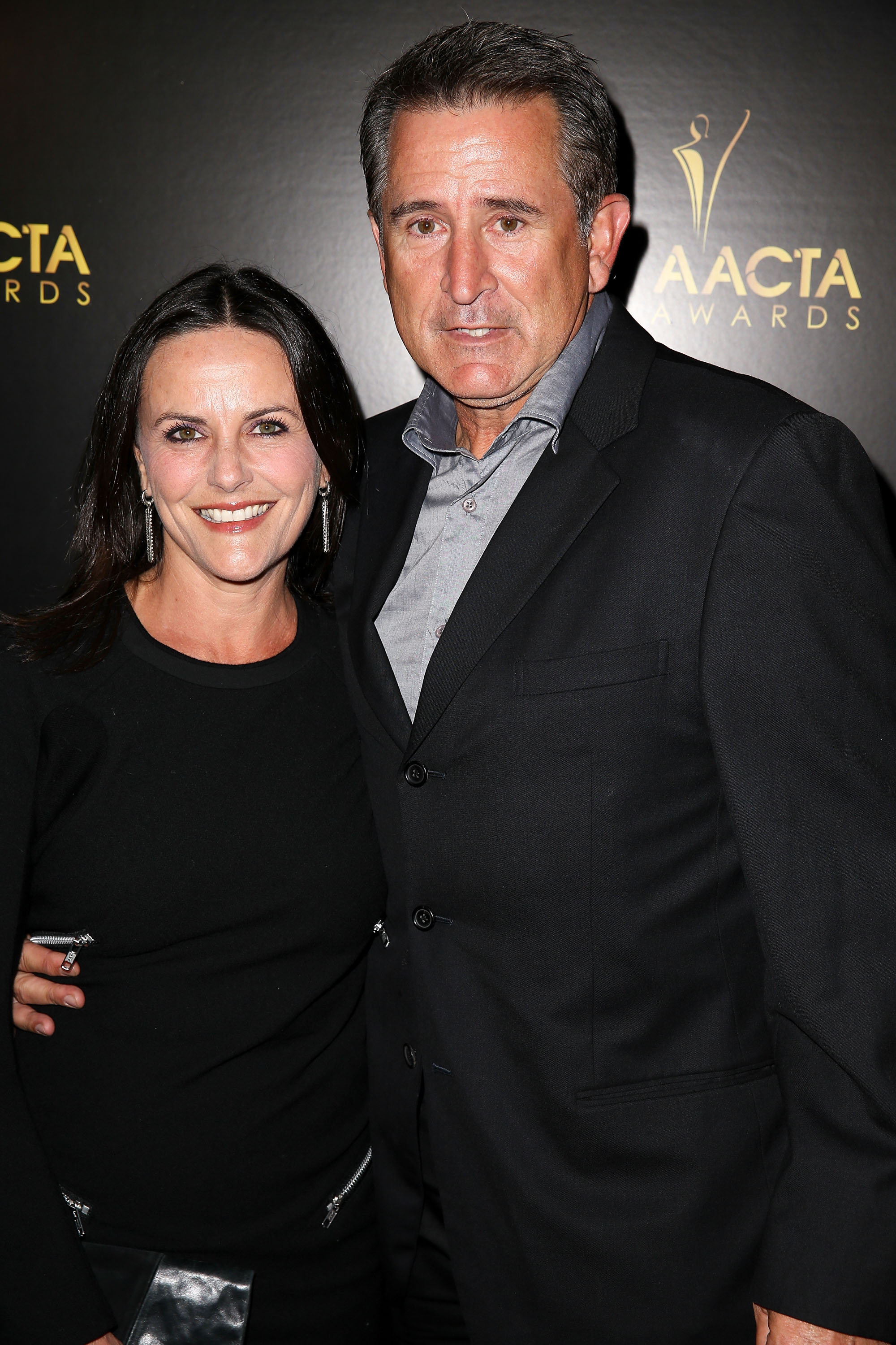 Anthony LaPaglia and actress Gia Carides pose at the 3rd Annual Australian Academy International Awards (AACTA) at Sunset Marquis Hotel & Villas on January 10, 2014, in West Hollywood, California | Source: Getty Images