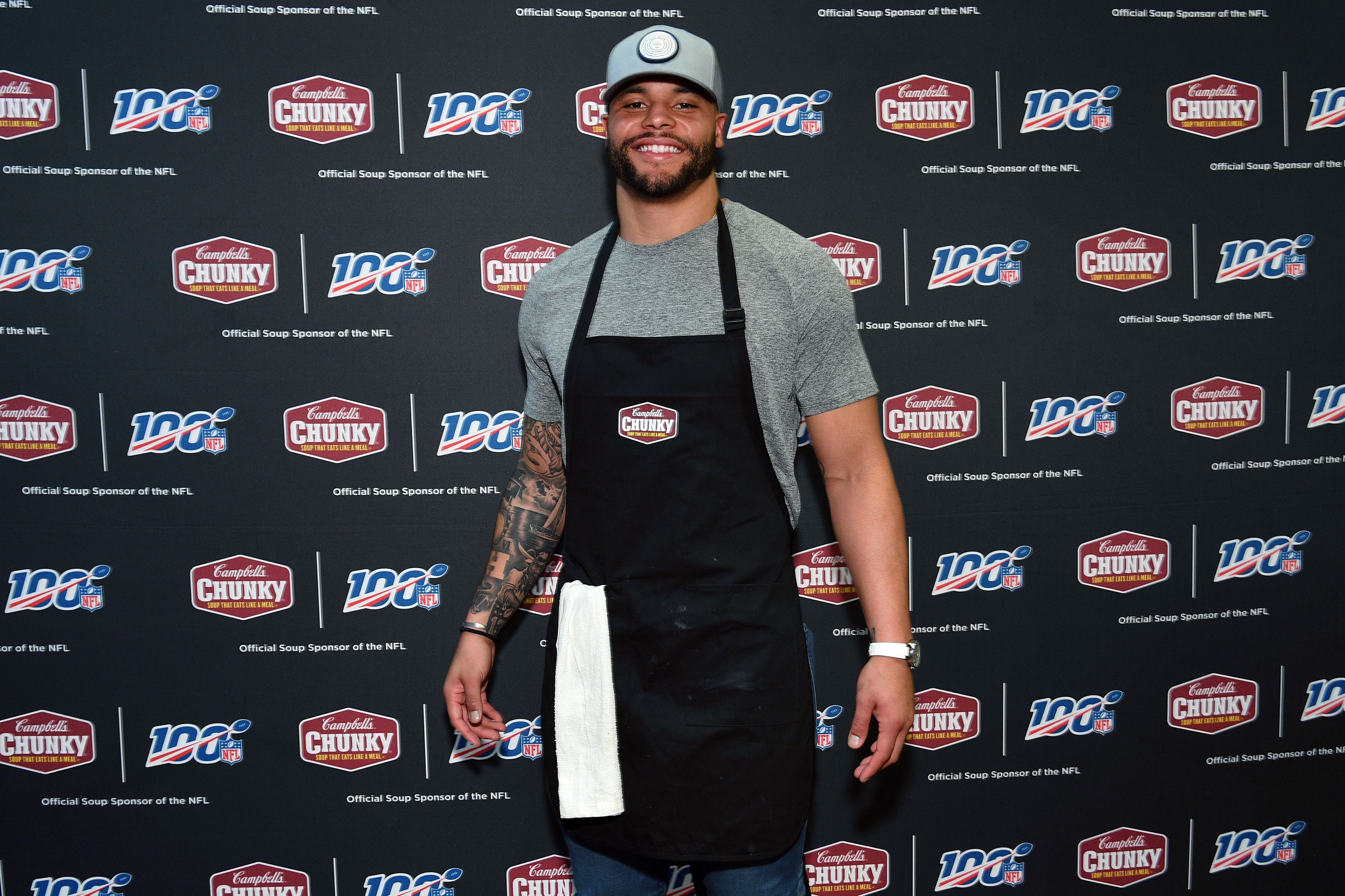Dak Prescott of the Dallas Cowboys donates soup to a Miami homeless shelter in January 2020 | Source: Getty Images