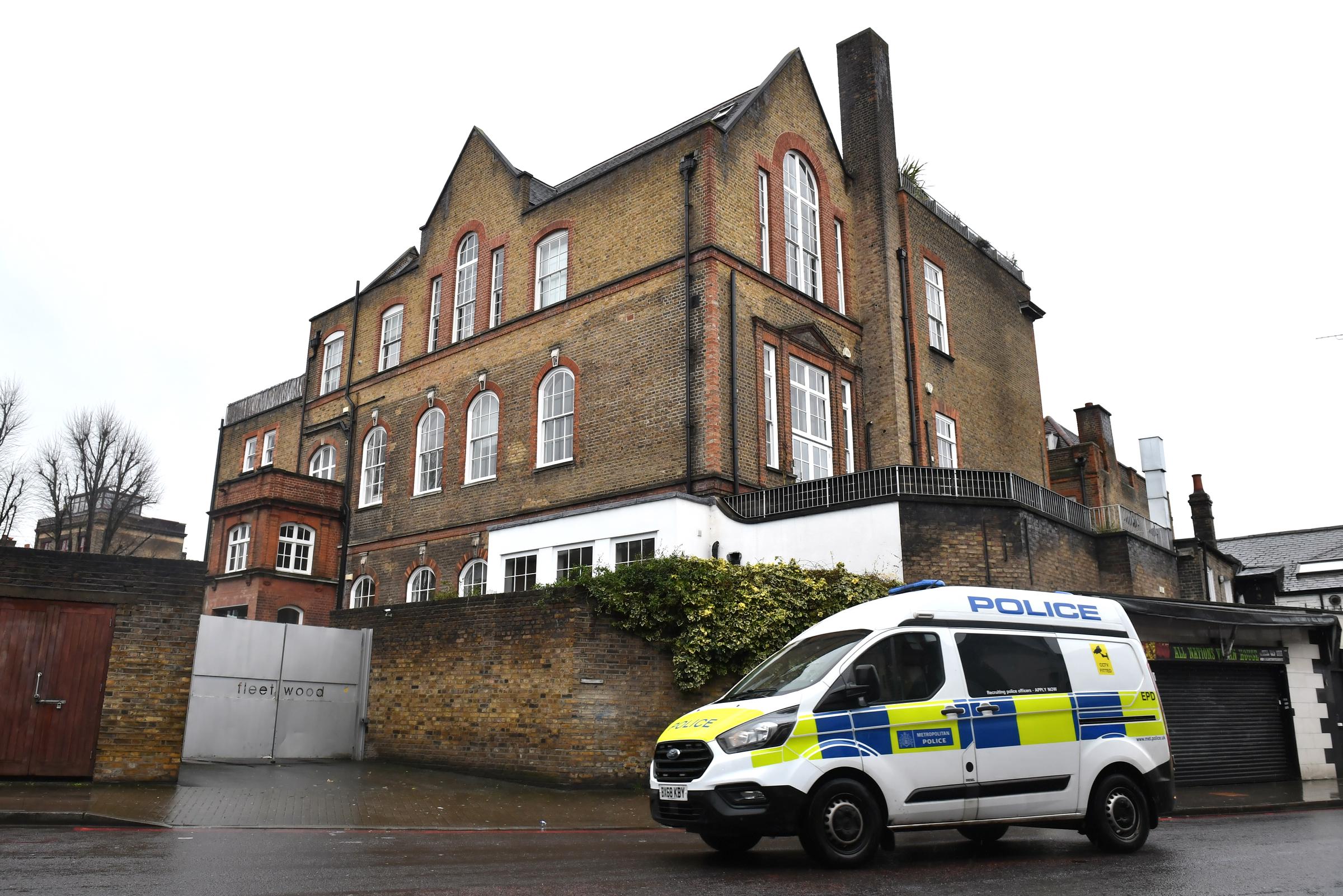 A police van parked outside the building believed to be where Caroline Flack lived in London, England. | Source: Getty Images