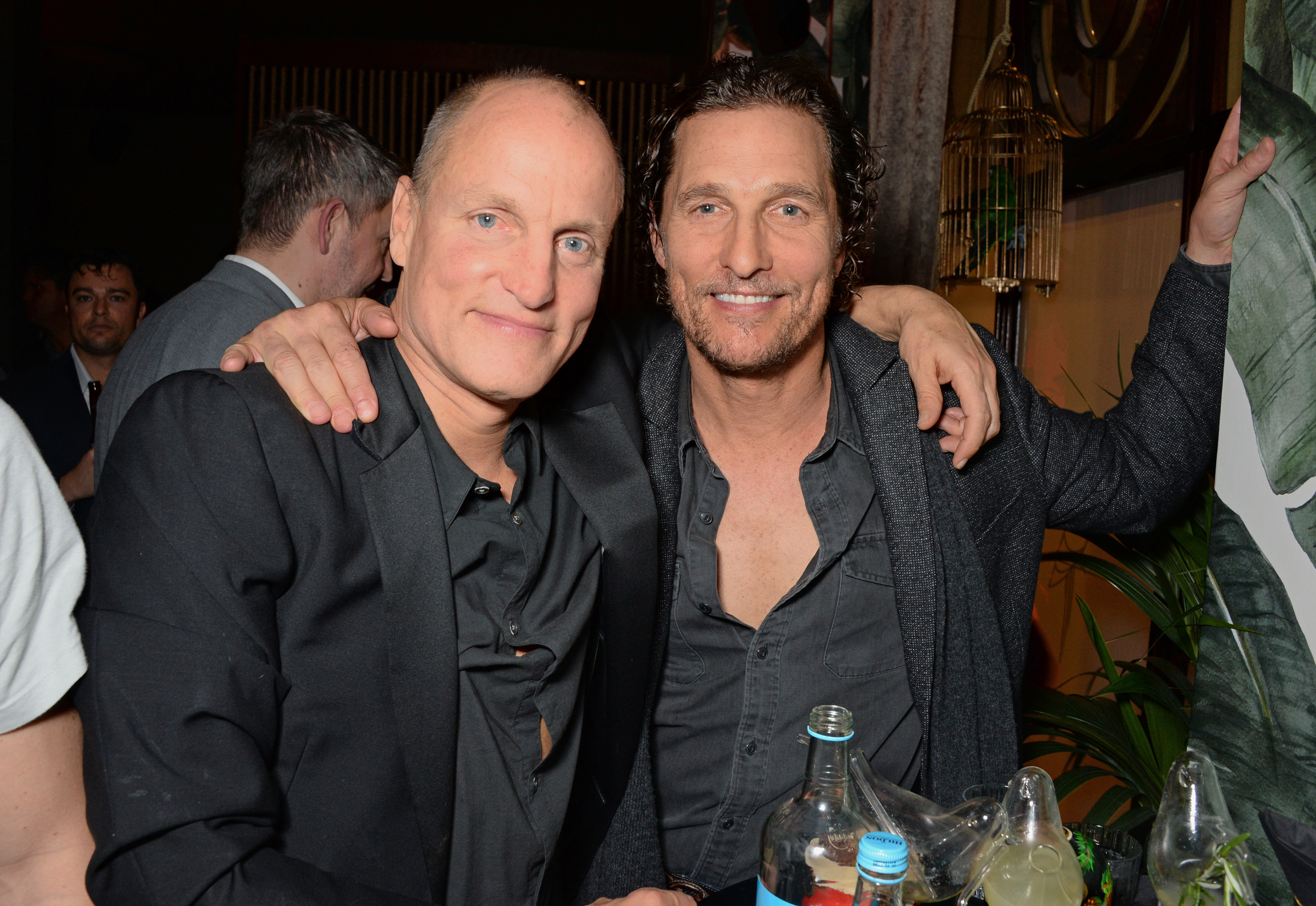 Woody Harrelson and Matthew McConaughey joining the festivities at the grand opening of The Parrot, a new bar at The Waldorf Hilton in London, England, hosted by Idris Elba on November 8, 2018 | Source: Getty Images
