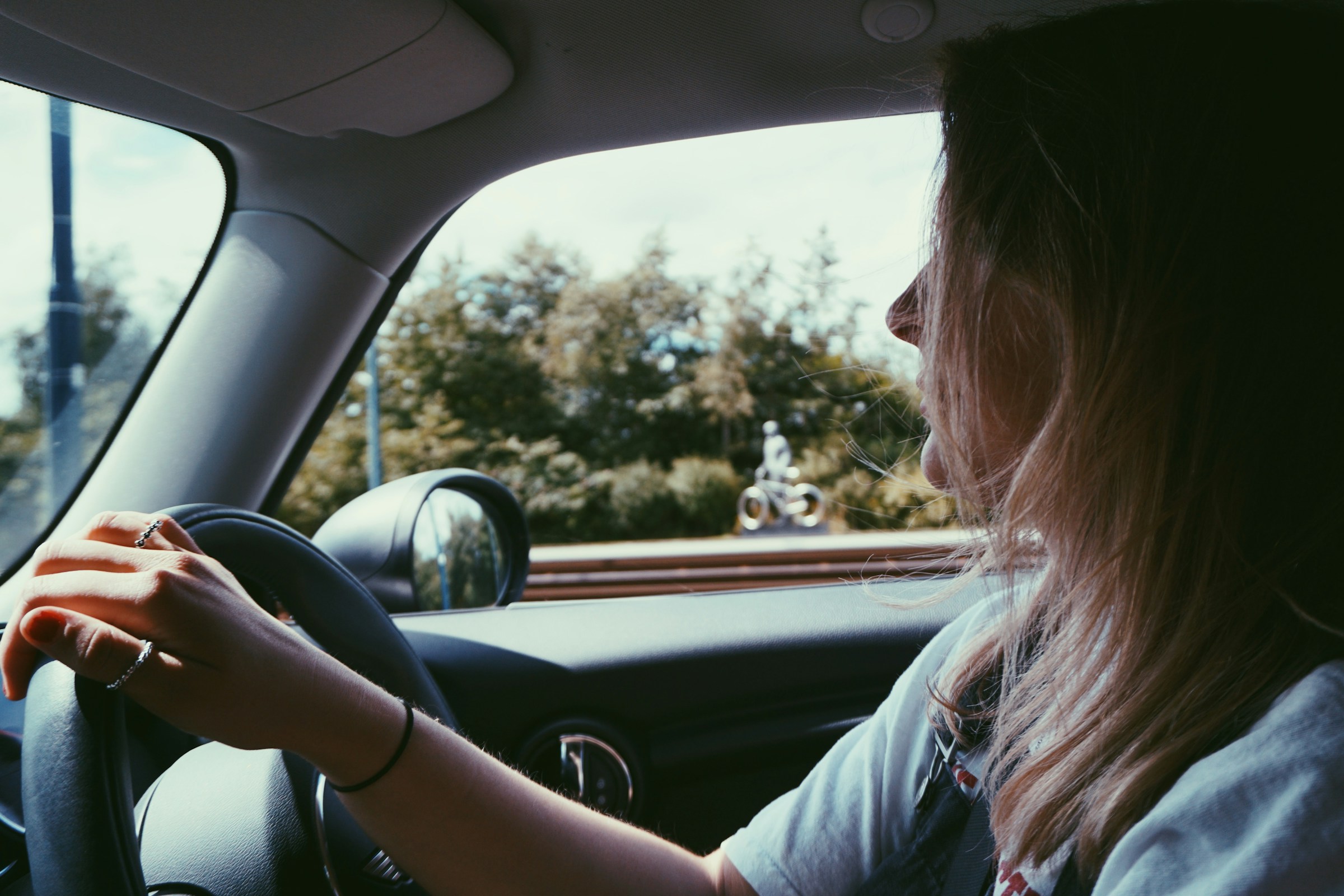 A woman driving her car | Source: Unsplash