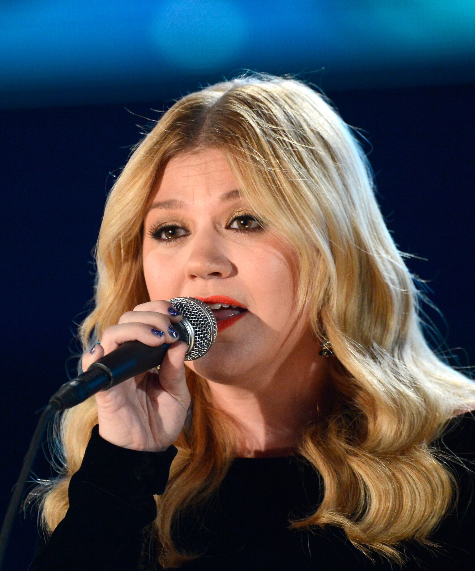  Kelly Clarkson performs onstage at the 55th Annual GRAMMY Awards at Staples Center | Getty Images