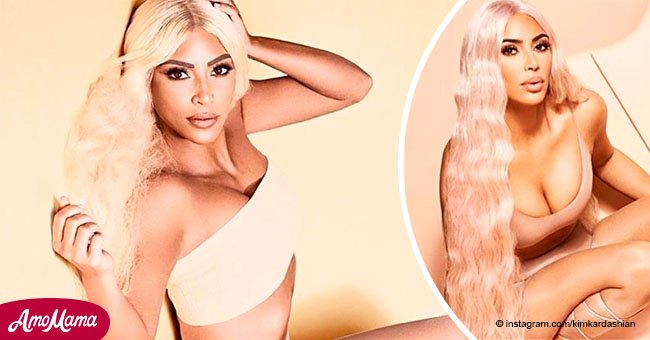 Kim Kardashian flaunts her envious curves in tights in racy new photos