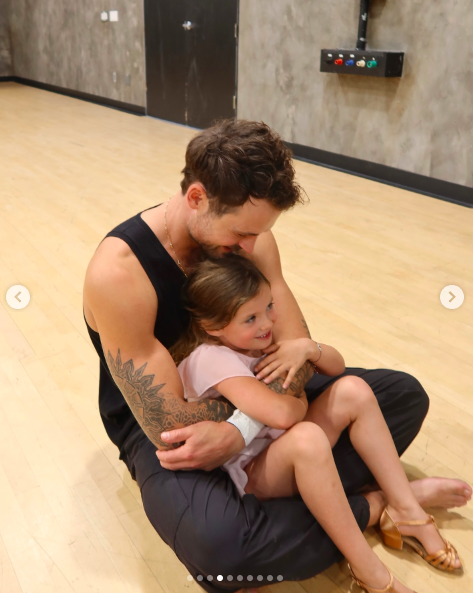 Dylan Efron embracing Olivia Efron during rehearsals at the "DWTS" studio, posted on October 12, 2025. | Source: Instagram/dylanefron