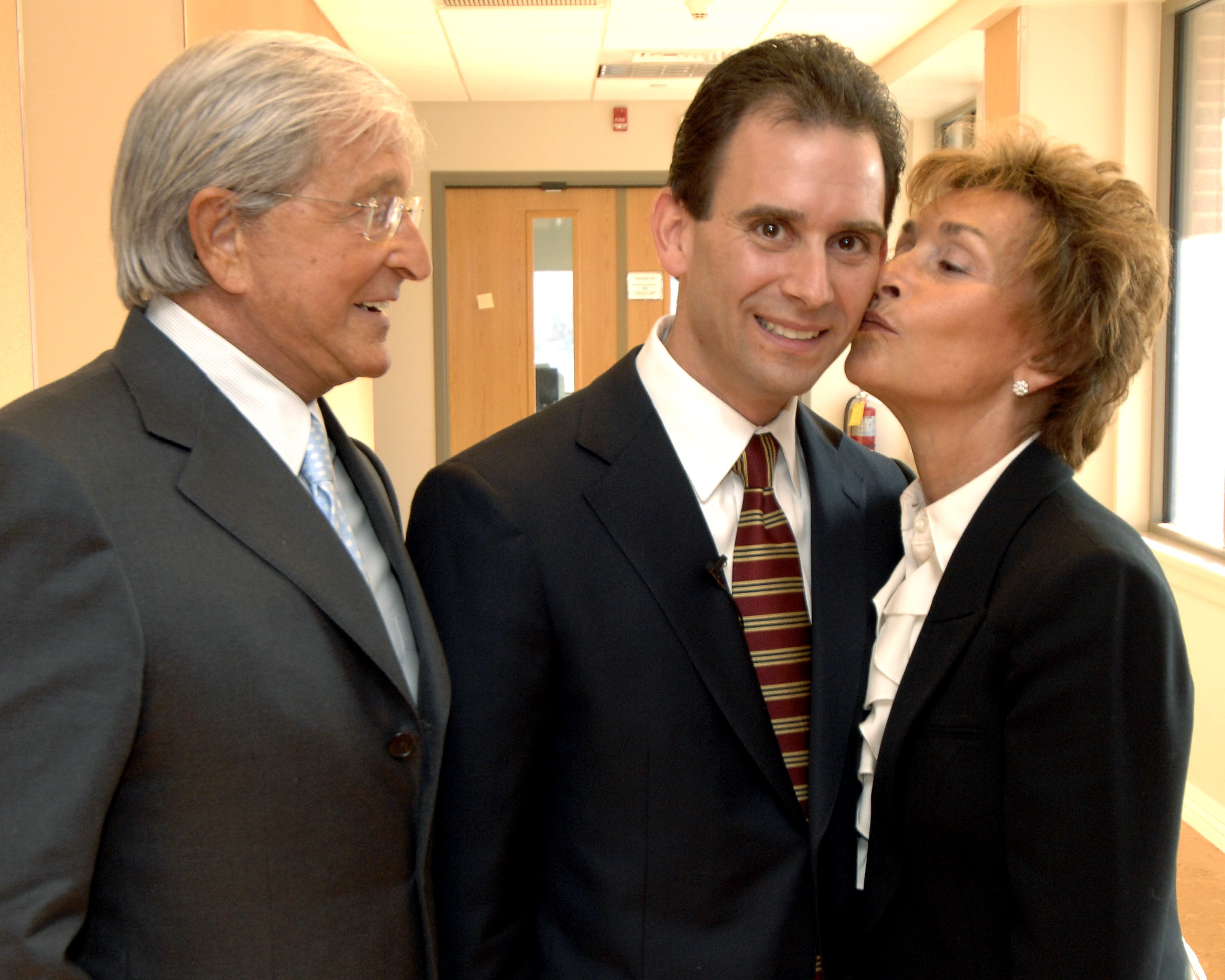 Judge Judy Sheindlin and Adam Levy, with ex-Bronx State Supreme Court Justice Gerald Sheindlin on January 23, 2007 | Source: Getty Images
