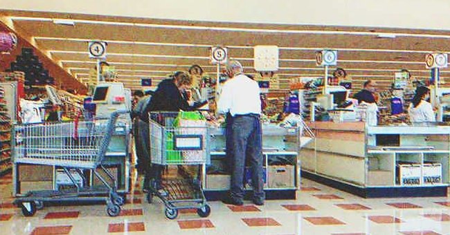 A few persons on a supermarket | Source: Shutterstock