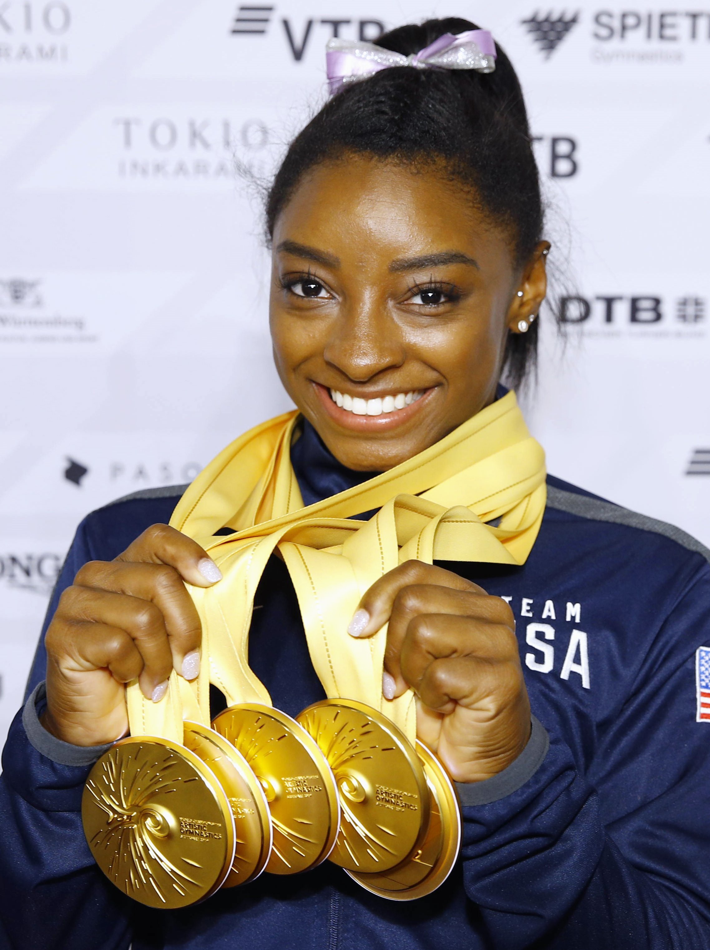 Simone Biles after winning five gold medals at the World Gymnastics Championships in Stuttgart, Germany, on October 13, 2019 | Source: Getty Images