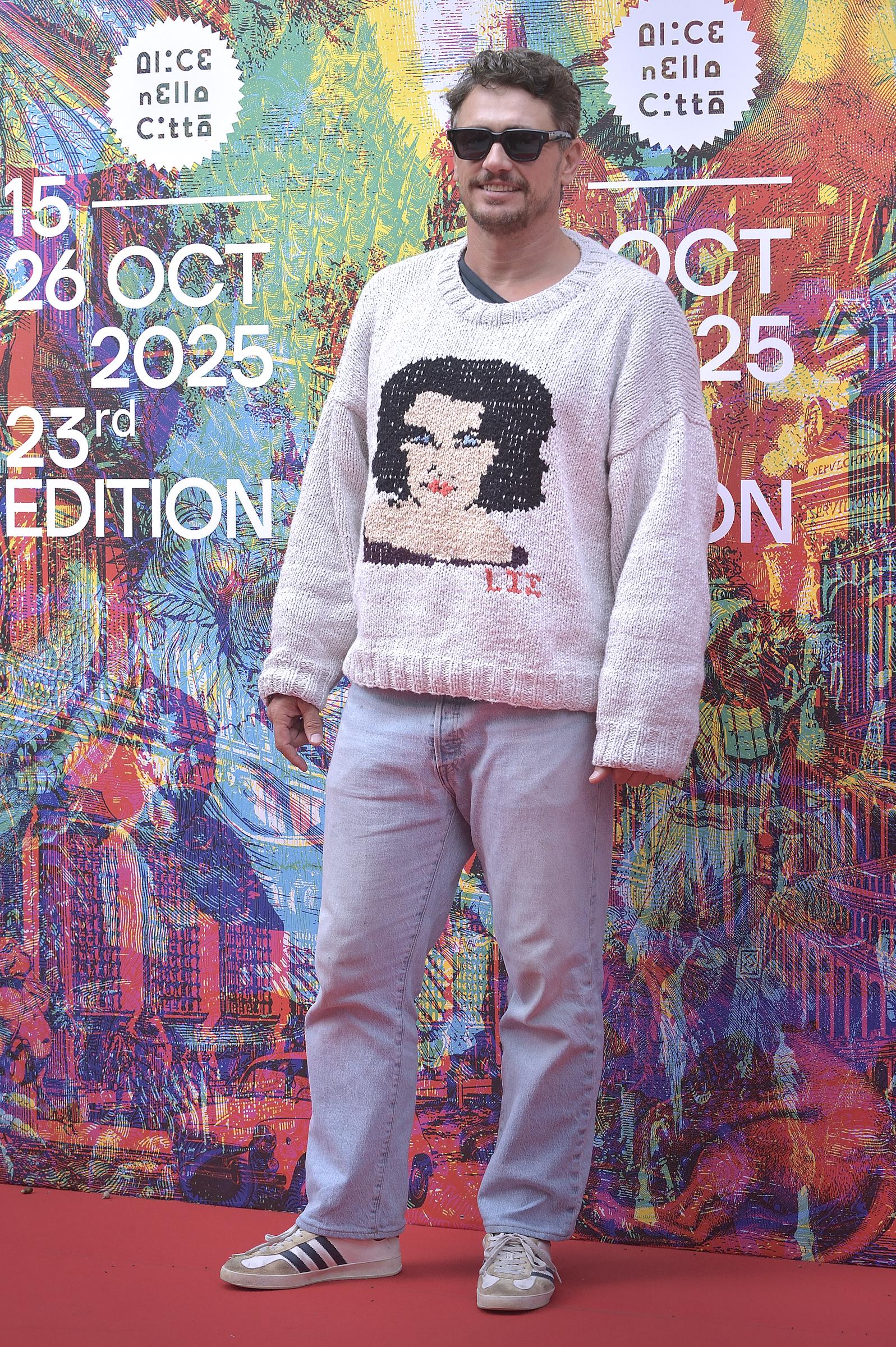 James Franco attends the Rome Film Fest wearing a graphic knit sweater and jeans. His laid-back outfit choice matched the informal vibe of the festival's vibrant opening day.